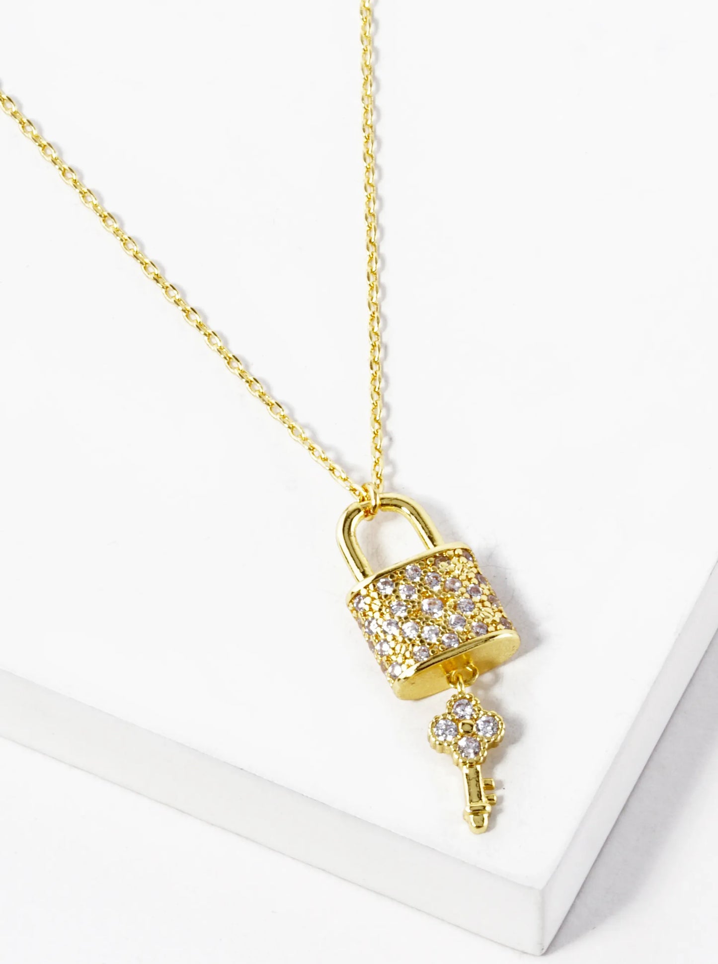White Gold Dipped CZ Pave Quatrefoil Key And Lock Pendant Necklace