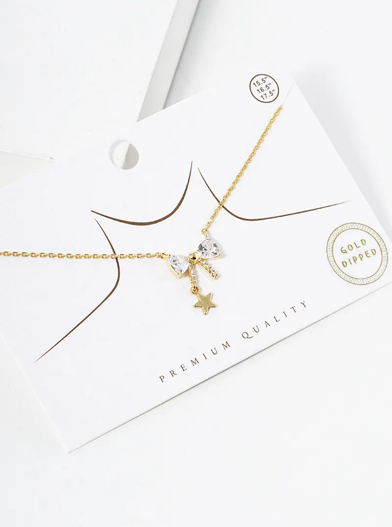 White Gold Dipped CZ Pave Star And Moon Pendant Necklace