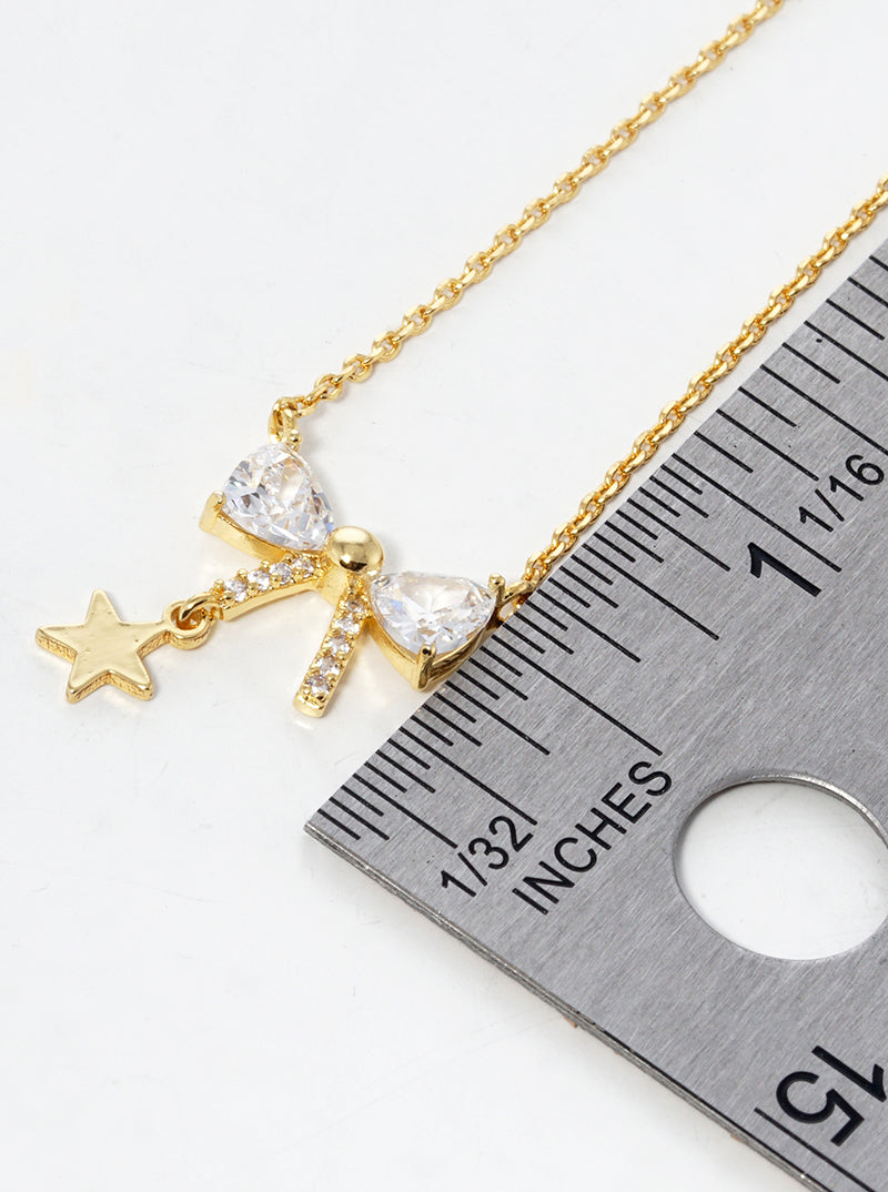 18K Gold Dipped CZ Pave Ribbon Bow With Star Drop Pendant Necklace