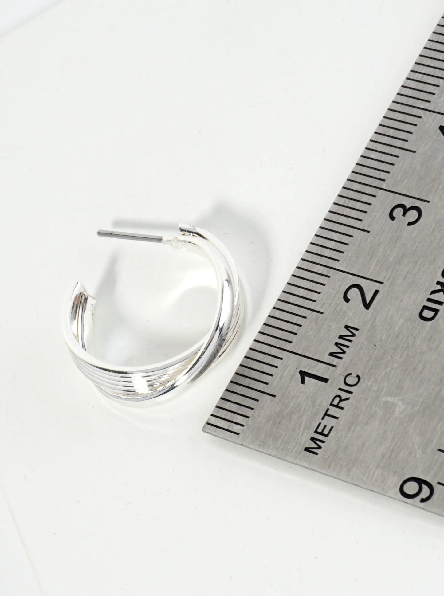 20mm Polished Metal Overlapping Hoop Earrings