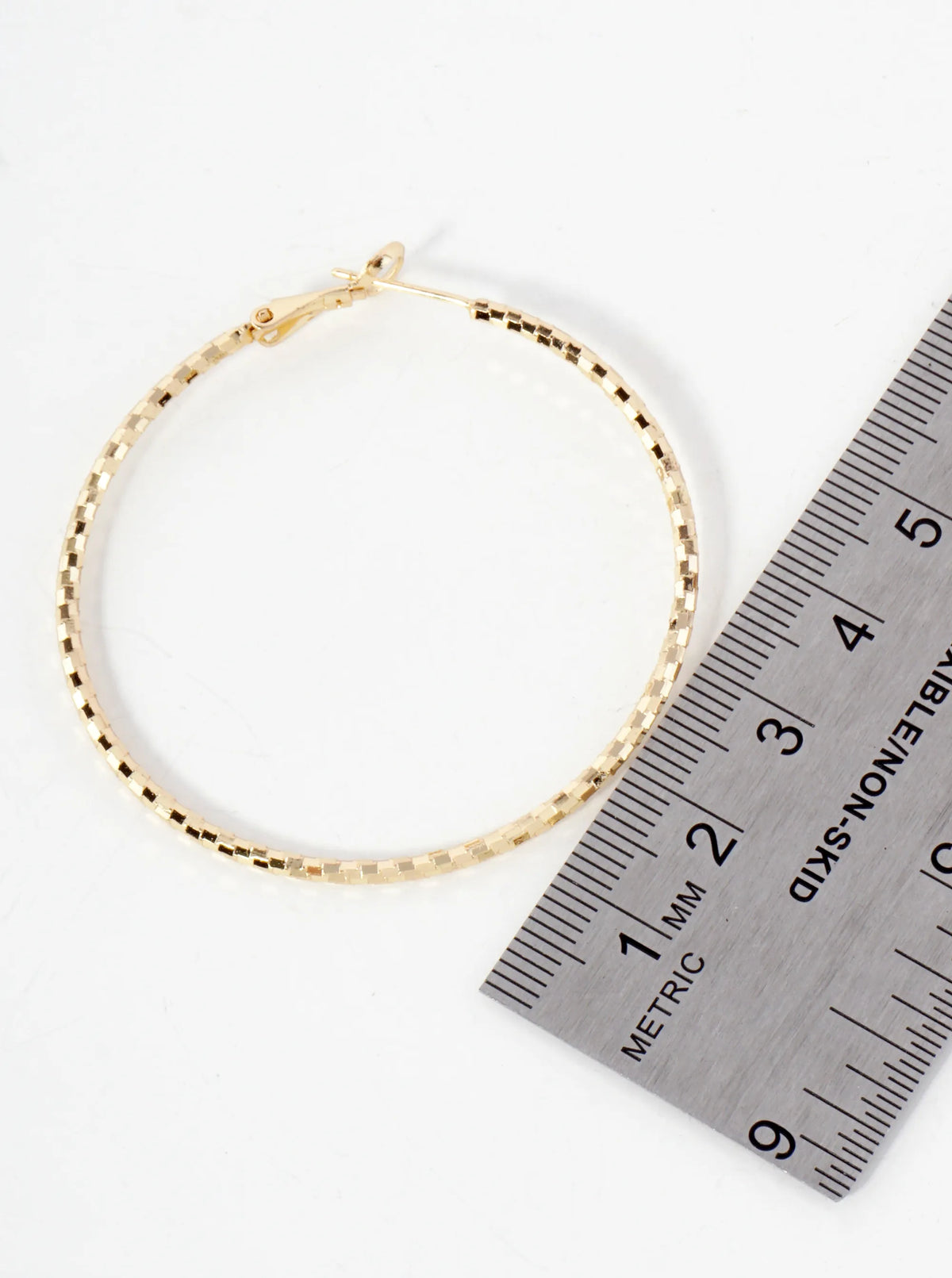 50mm Shiny Textured Brass Hoop Earrings