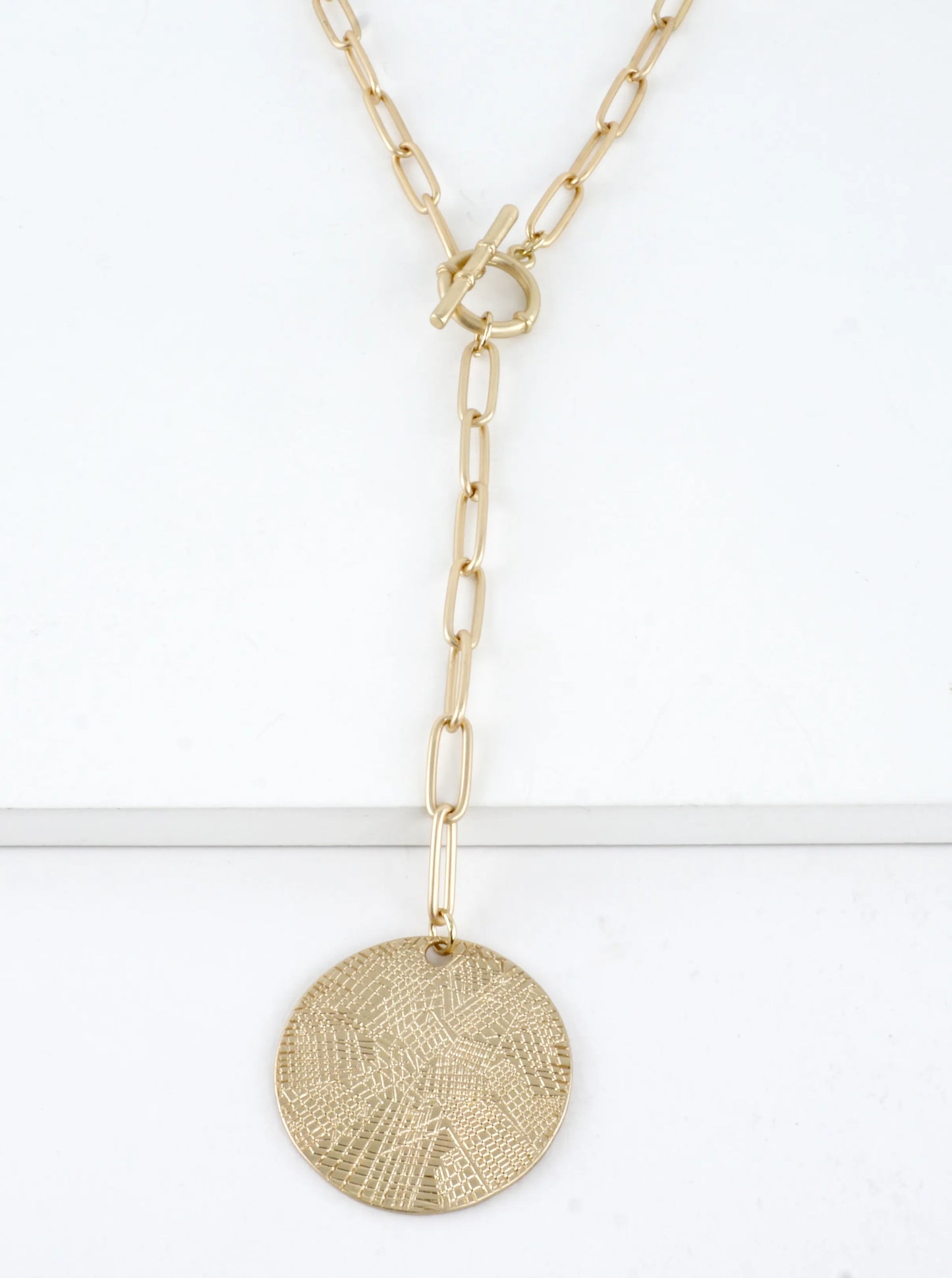 Textured Round Pendant On Lariat Toggle Necklace
