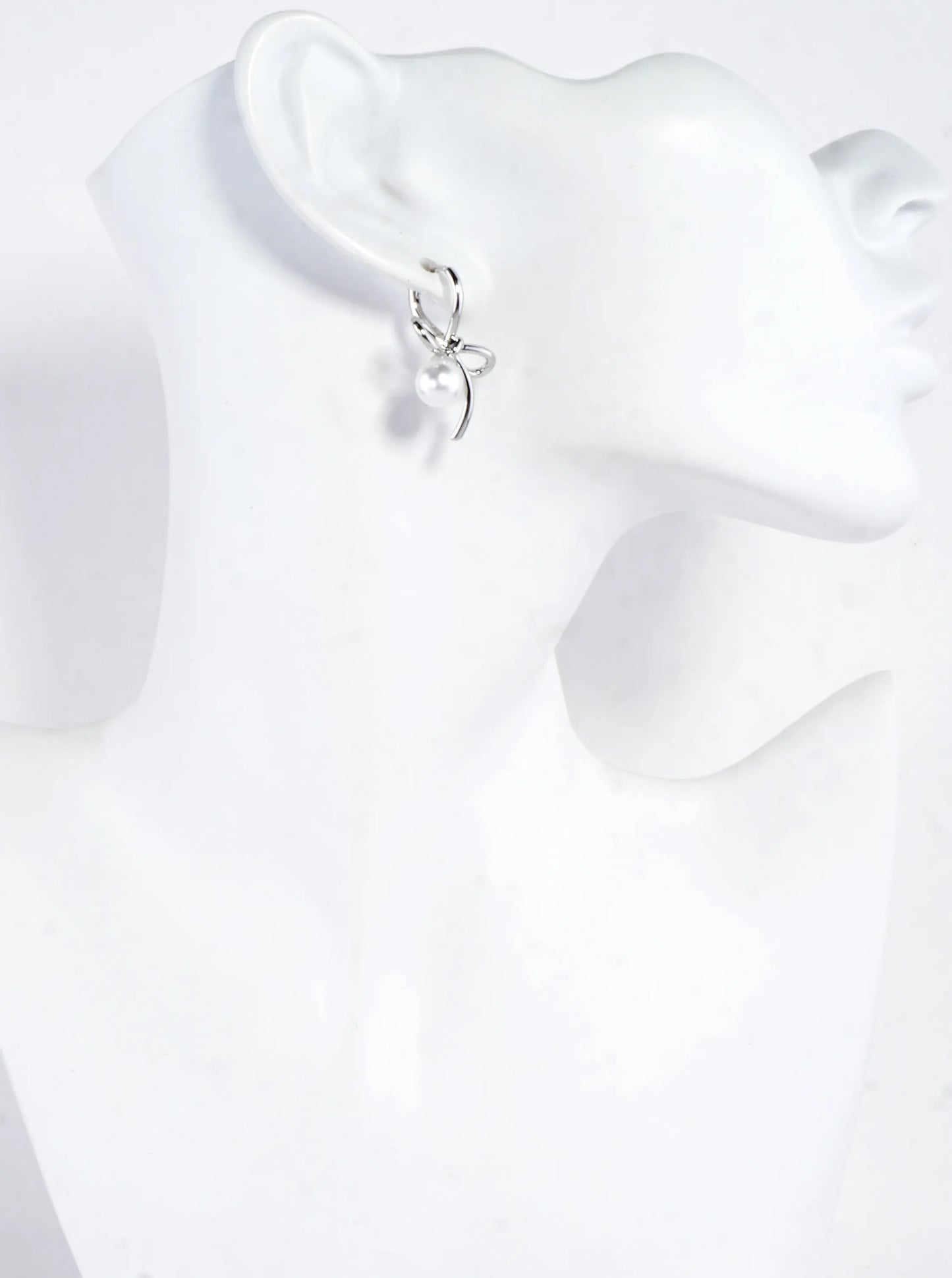 Brass Bow On Pearl Pedestal Drop Earrings