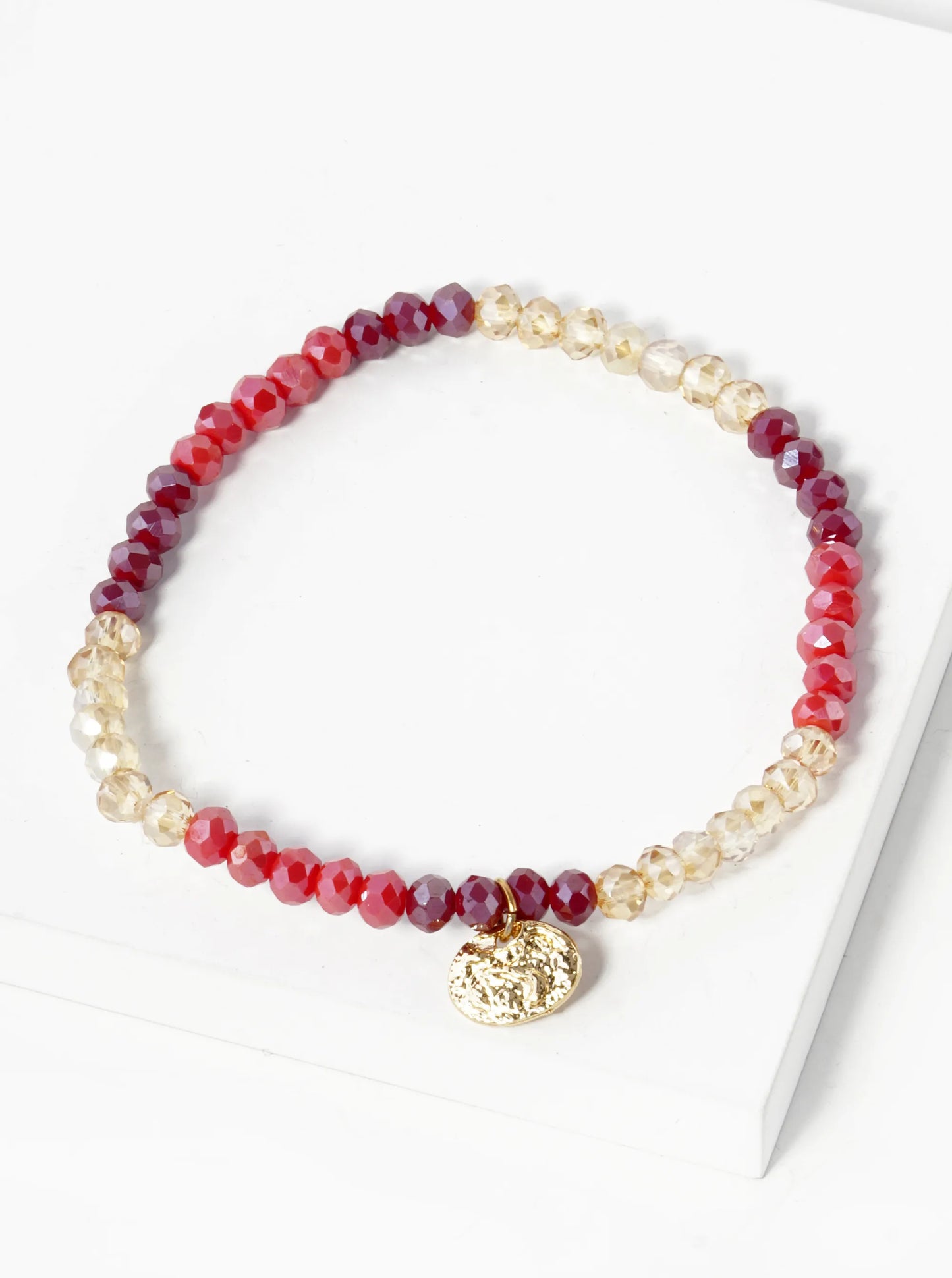 Faceted Glass Beaded Ombre Stretch Bracelet With Oval Metal Charm