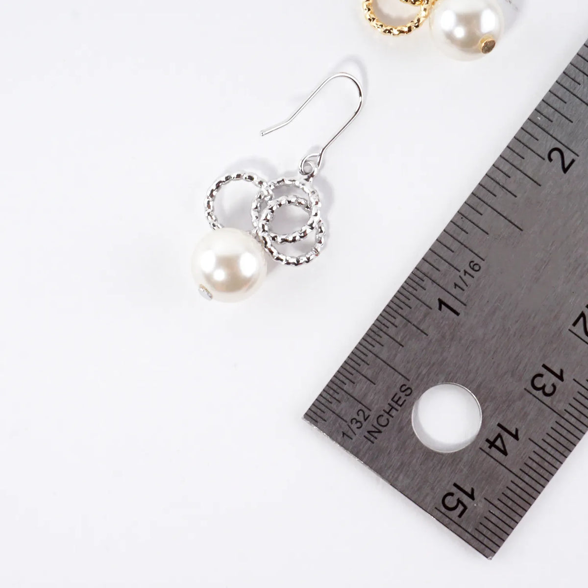 Glass Pearl And Brass Ring Cluster Drop Earrings