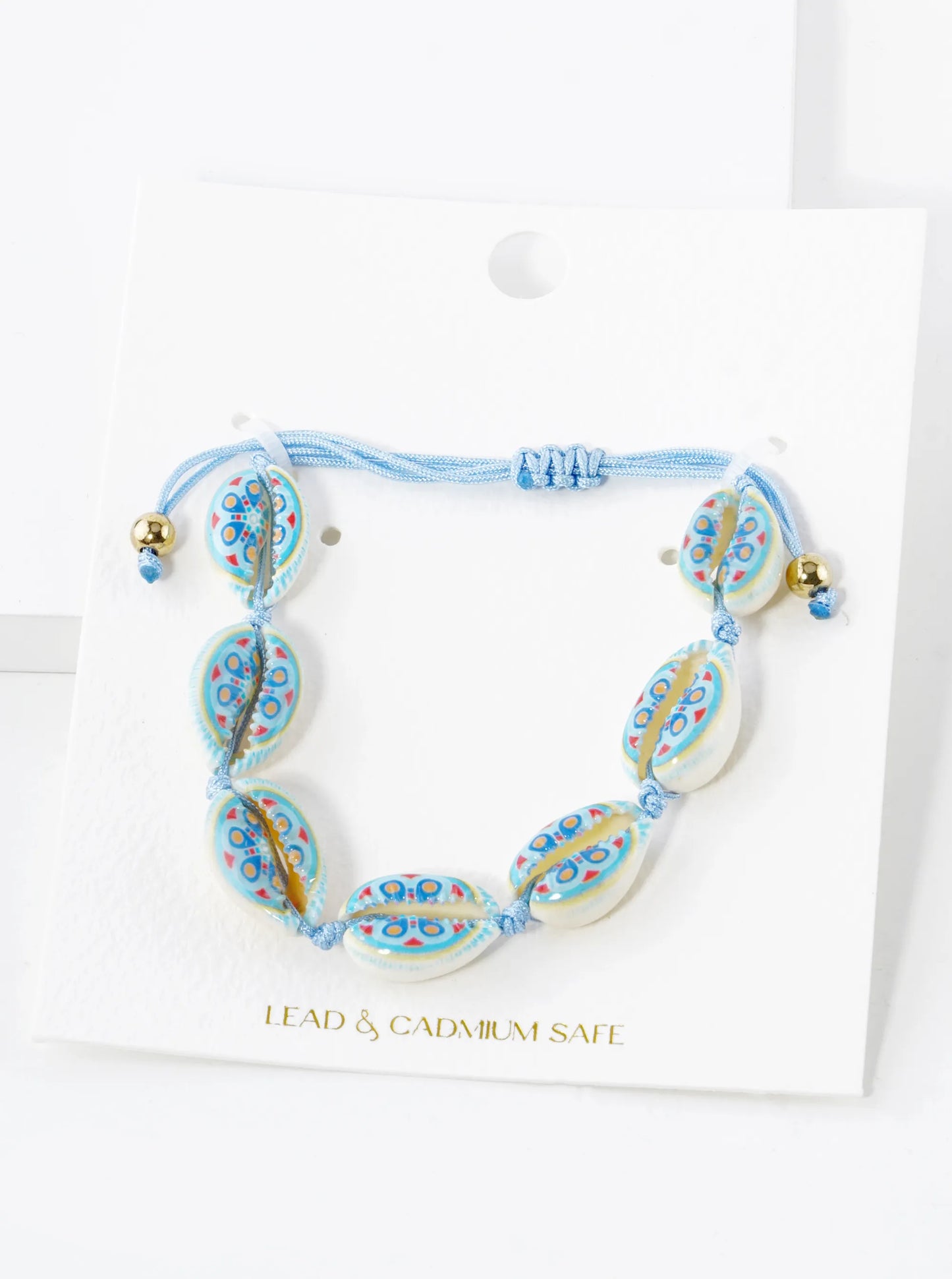 Multi Patterned Cowrie Shell Pull-Tie Bracelet