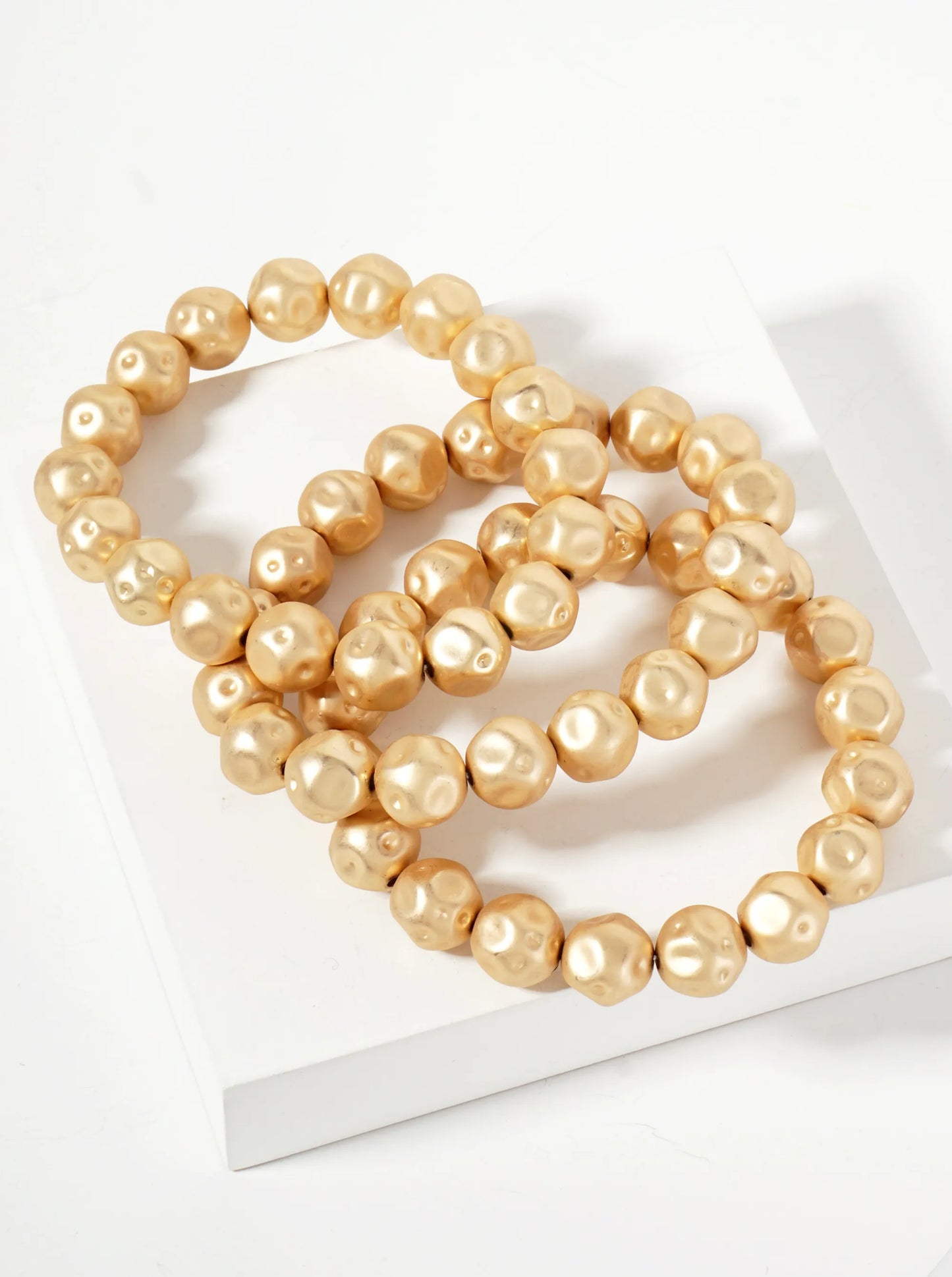 Set Of 3 Textured Metallic Beaded Stackable Stretch Bracelet