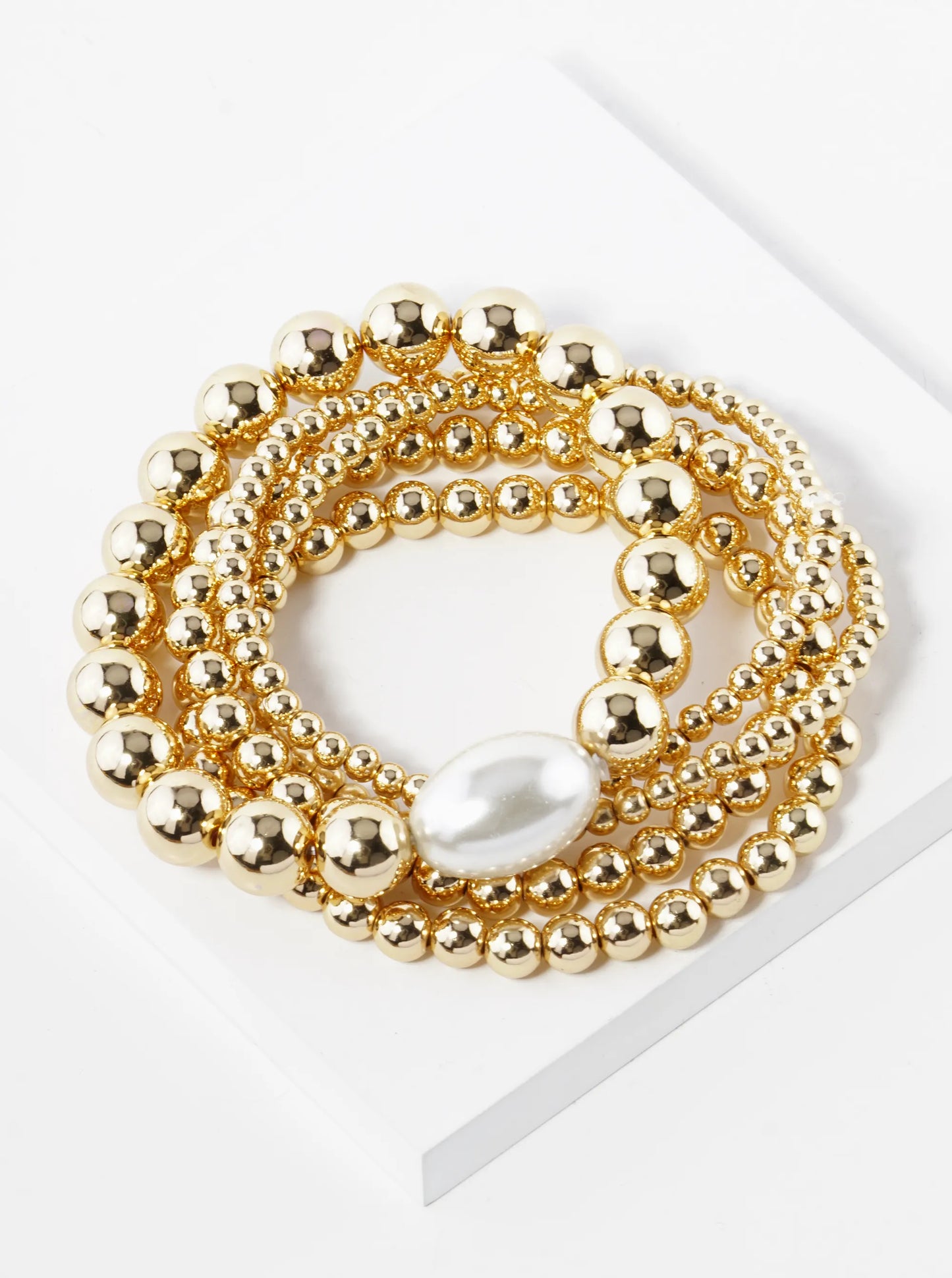 Set Of 5 Graduated Metallic Beaded Stackable Stretch Bracelet With Pearl Accents