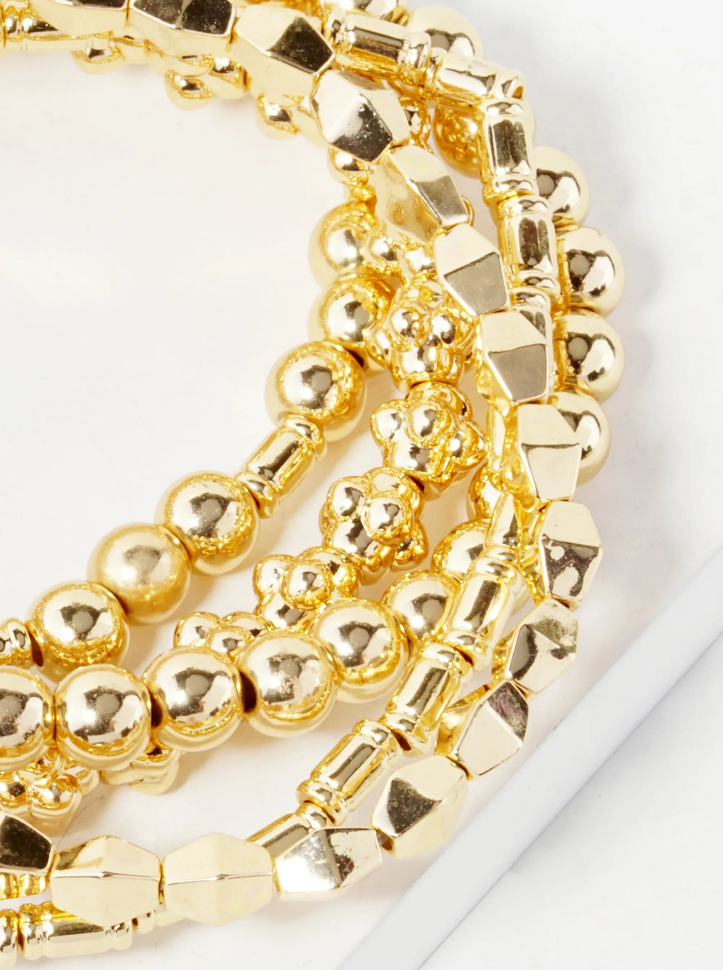 Set Of 5 Multi Shape Metallic Beads Stackable Stretch Bracelet