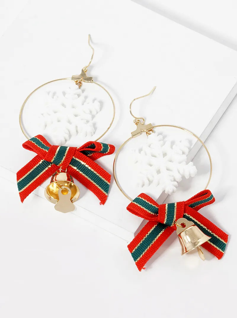 Snowflake Ribbon Bow And Jingle Bell Christmas Earrings