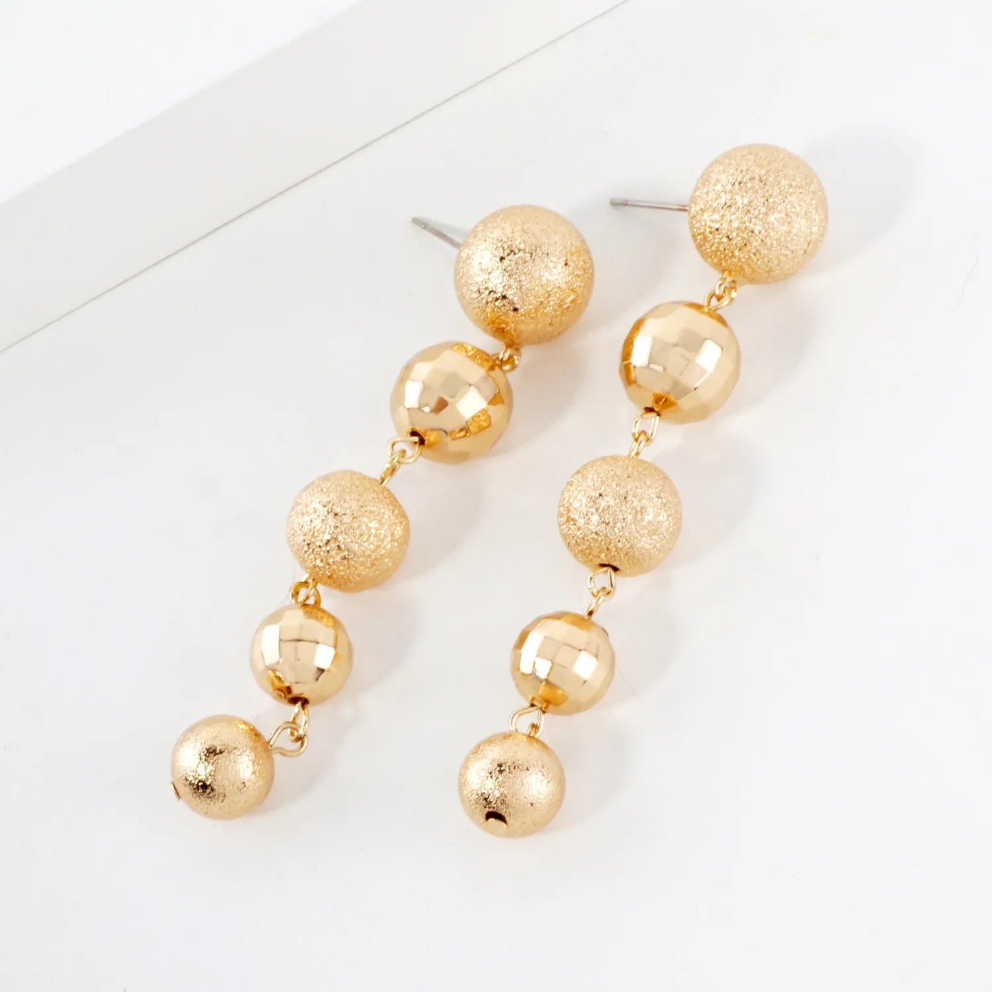 Textured Graduated Brass Ball Drop Earrings With-Titanium-Post