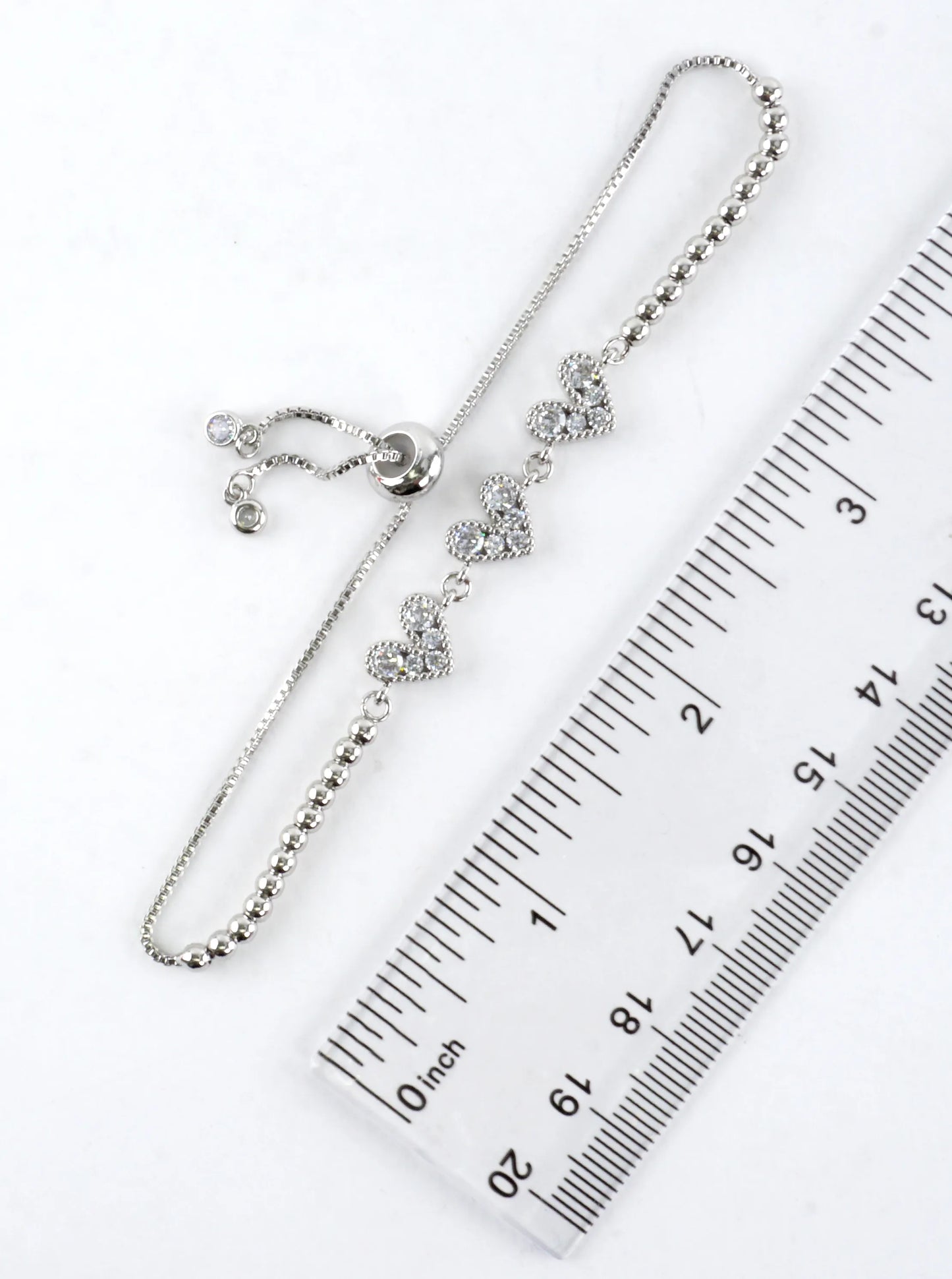 Three Hearts Stainless Steel CZ Pull Tie Bracelet