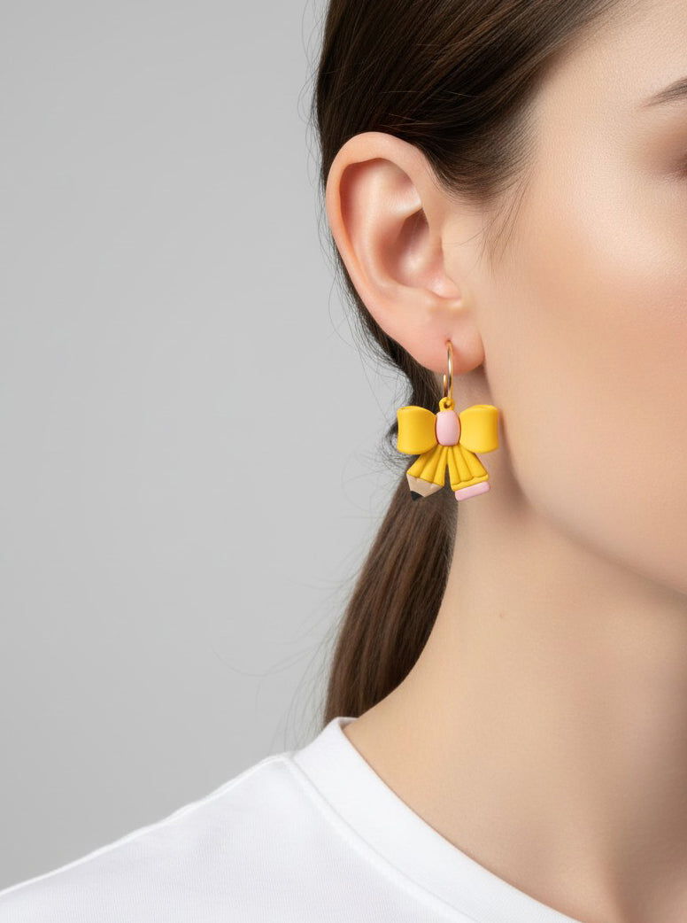 Whimsical Pencil Bow Huggie Earrings