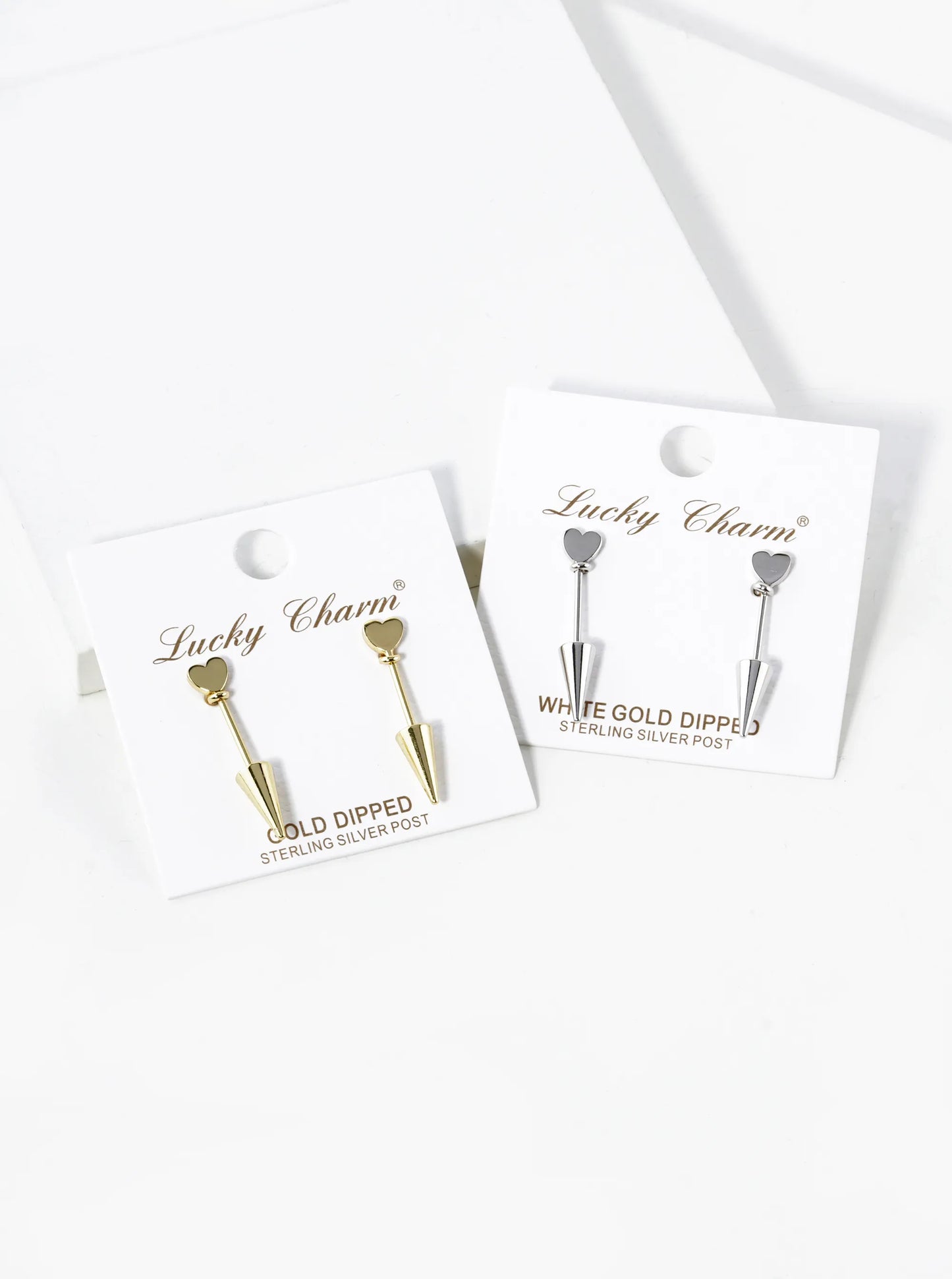 White Gold Dipped 1 Inch Cupid Arrow Stud Earrings