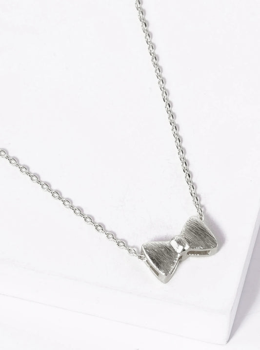 White Gold Dipped Brushed Metal Ribbon Bow Pendant Necklace