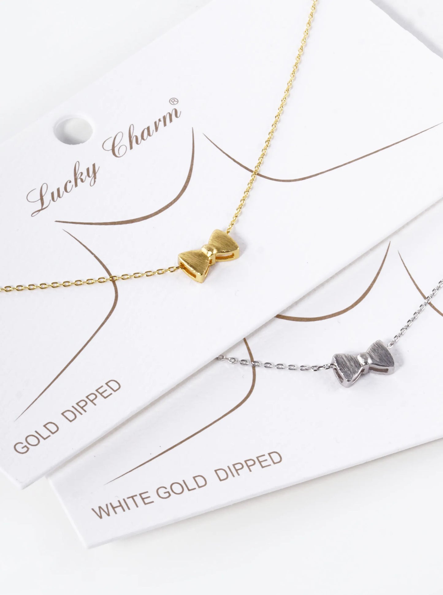 White Gold Dipped Brushed Metal Ribbon Bow Pendant Necklace