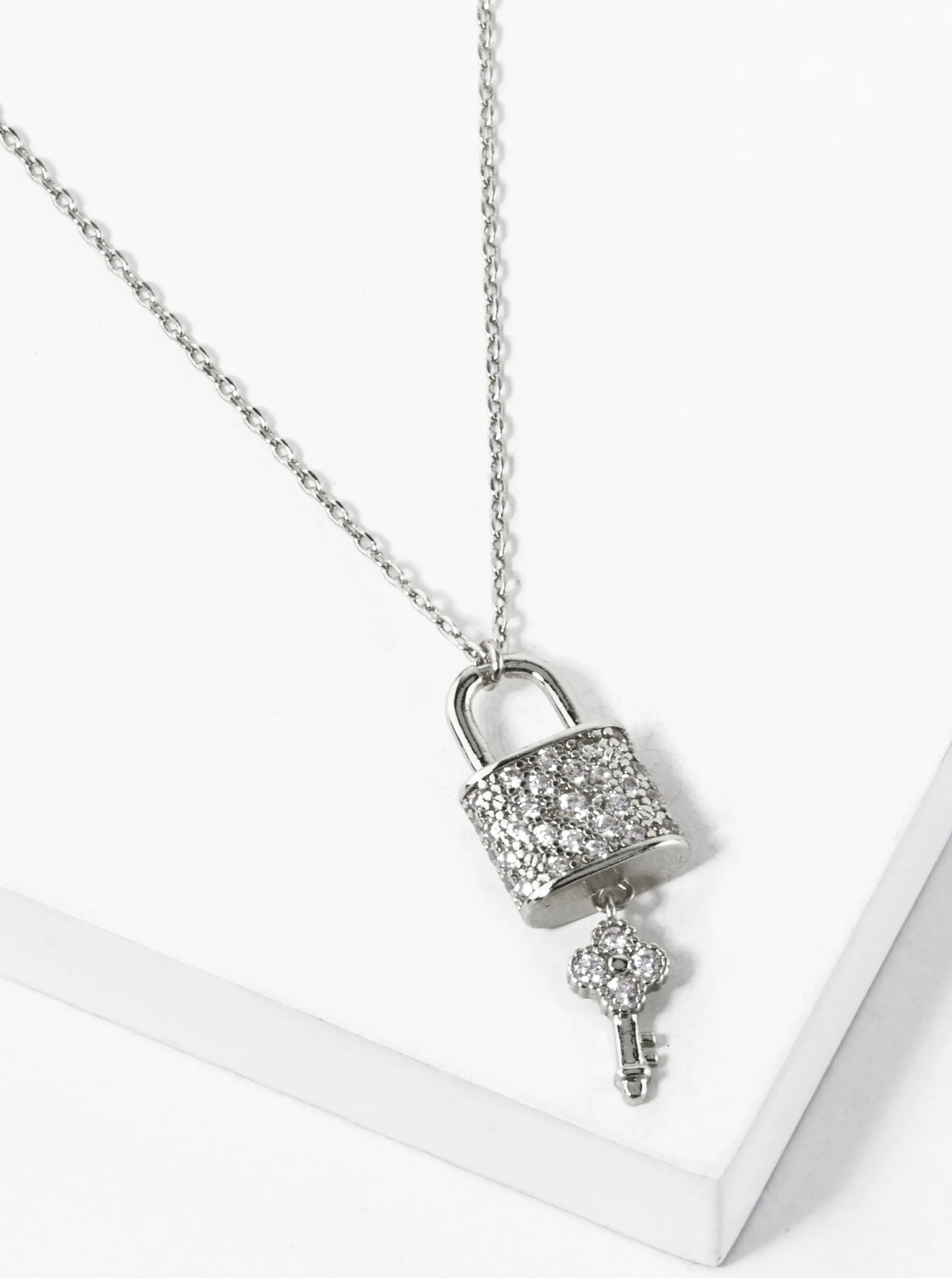 White Gold Dipped CZ Pave Quatrefoil Key And Lock Pendant Necklace