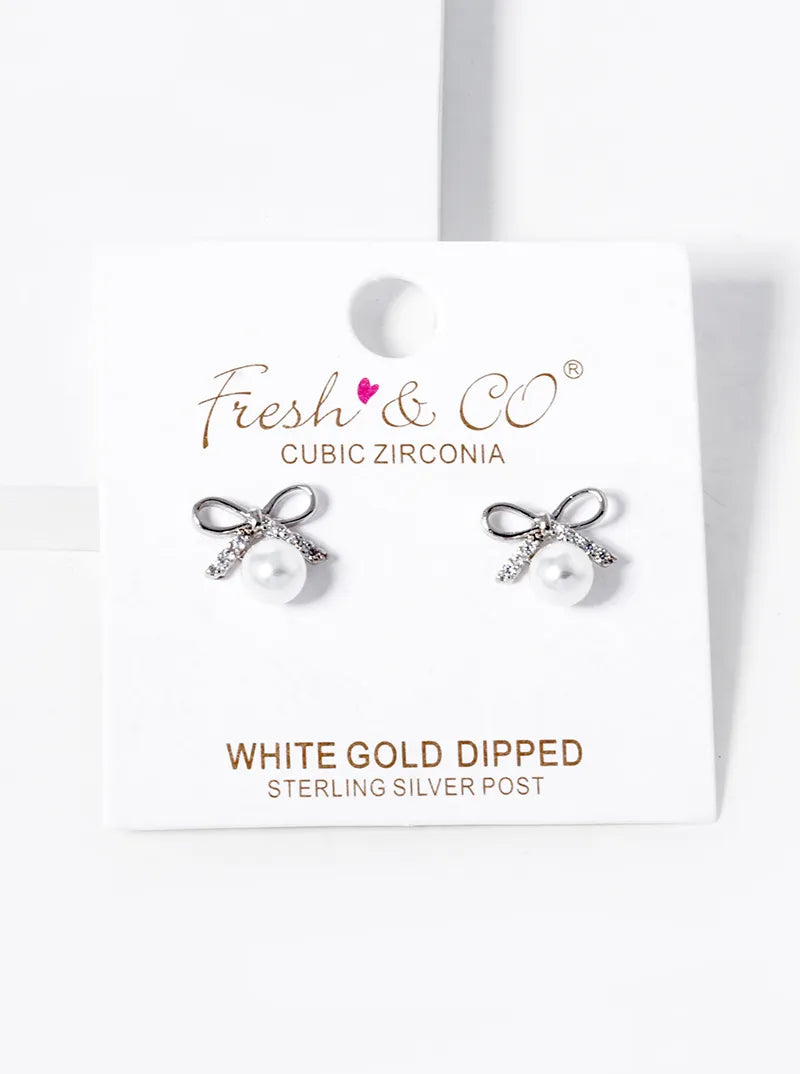 White Gold Dipped Pearl Drop CZ Pave Ribbon Bow Stud Earrings