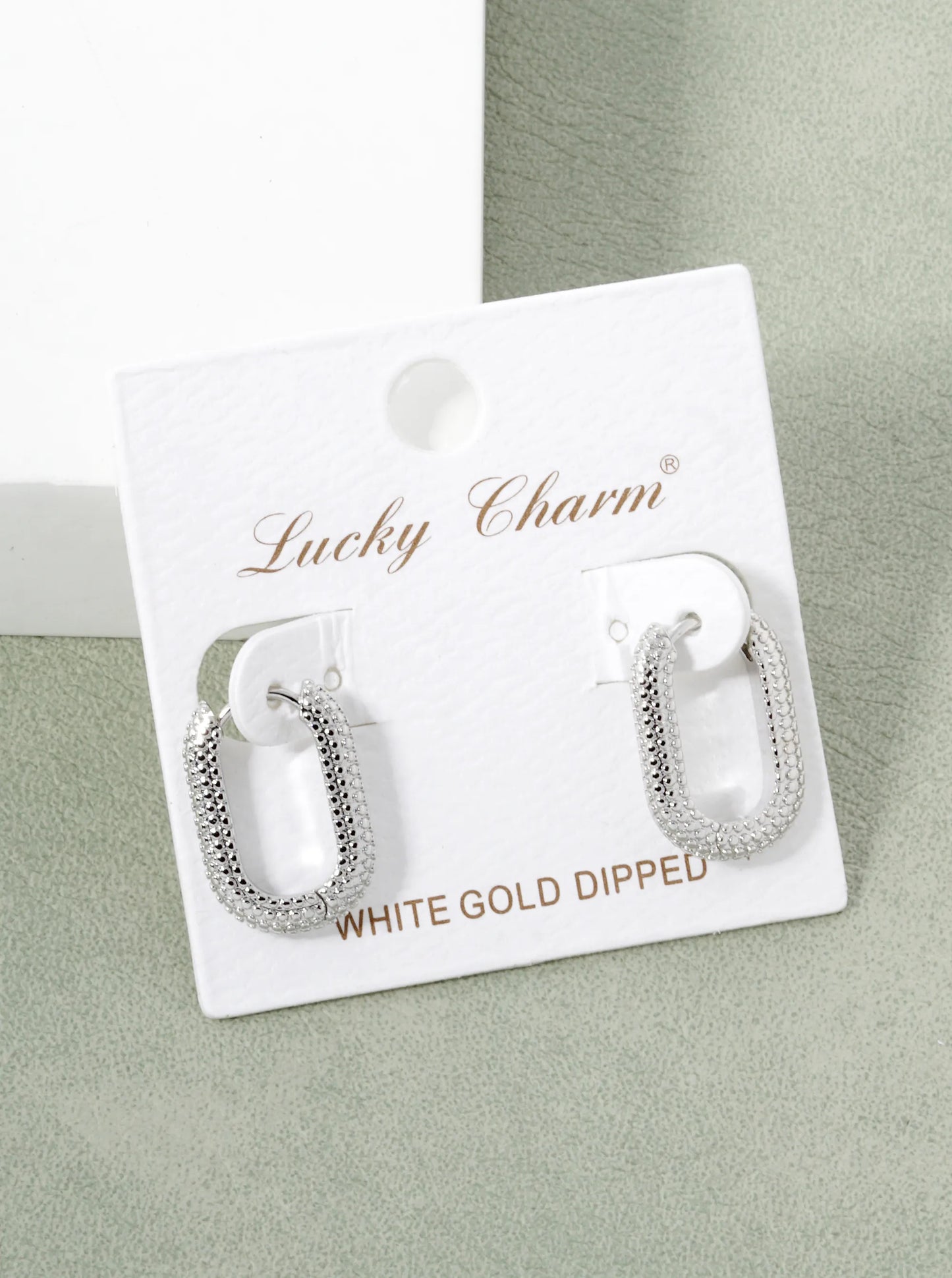 White Gold Dipped Textured 20mm Oval Hoop Earrings