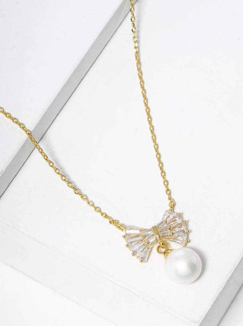 18K Gold Dipped Baguette CZ Ribbon Bow With Glass Pearl Drop Pendant Necklace