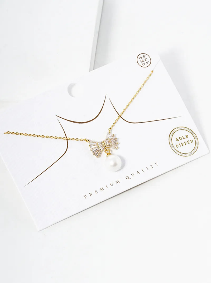 18K Gold Dipped Baguette CZ Ribbon Bow With Glass Pearl Drop Pendant Necklace