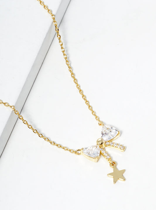 18K Gold Dipped CZ Pave Ribbon Bow With Star Drop Pendant Necklace