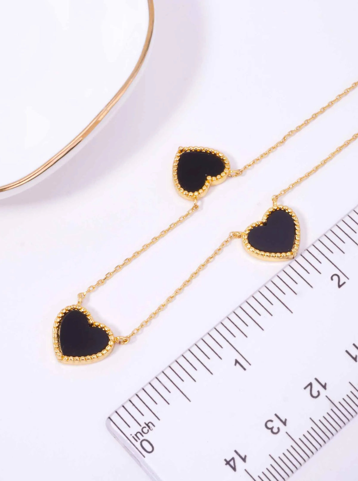 18K-Gold-Dipped-Three-Heart-Charm-Necklace-61-PN2418-GBK-1-WOI2J731082626K1135.jpg