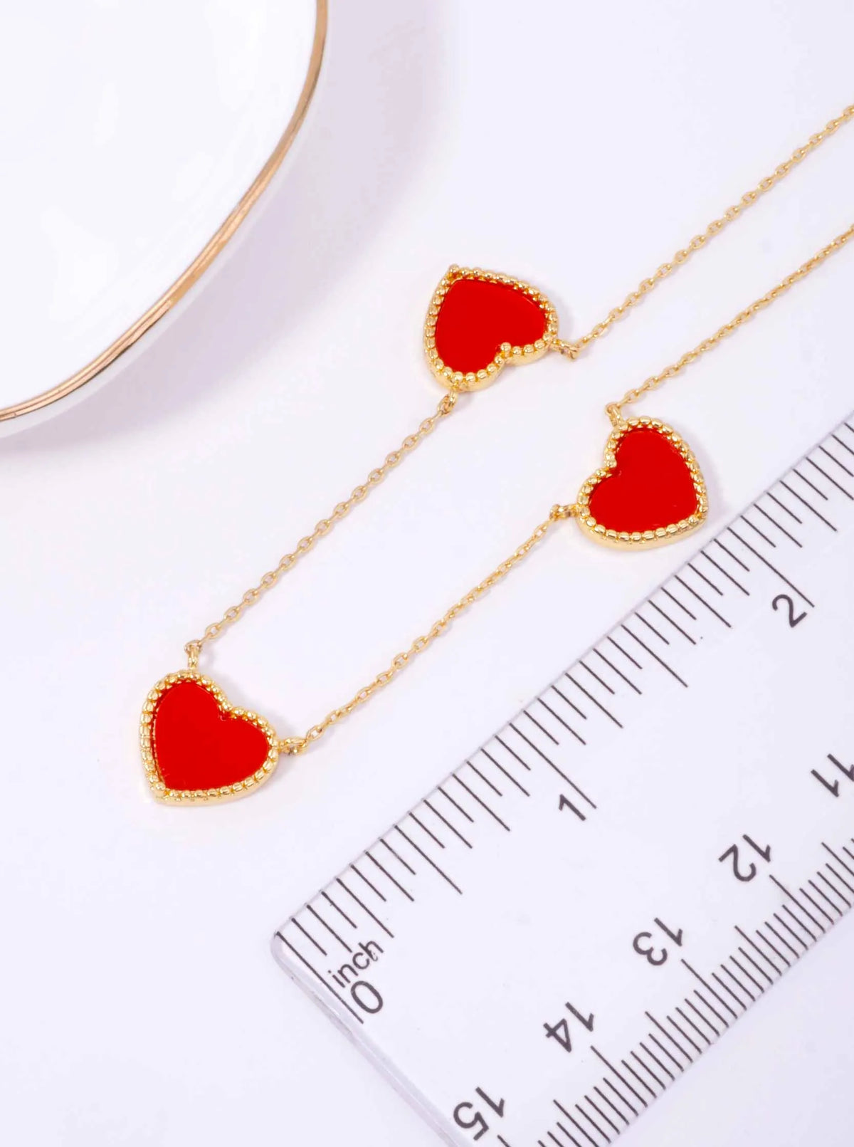 18K-Gold-Dipped-Three-Heart-Charm-Necklace-61-PN2418-GRD-1-64J1DG31082626K1135.jpg