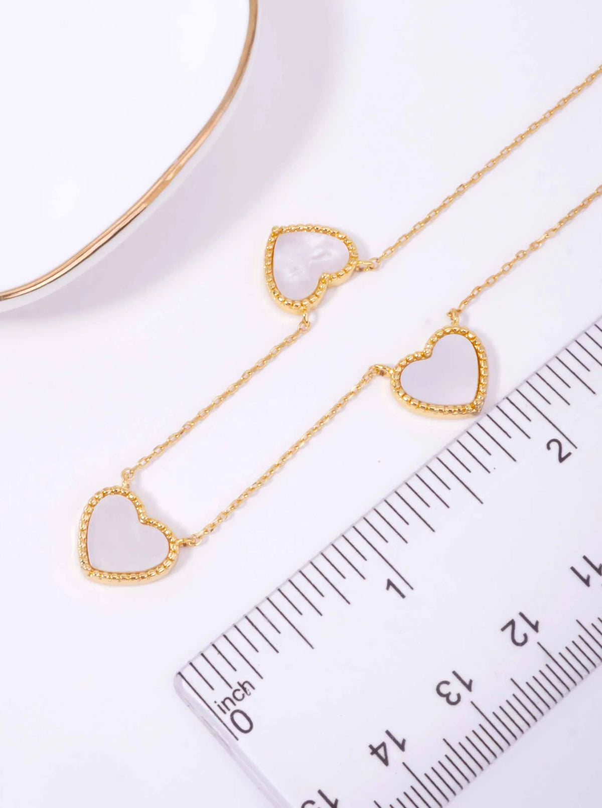 18K-Gold-Dipped-Three-Heart-Charm-Necklace-61-PN2418-GWH-1-JFVYYF31082626K1135.jpg