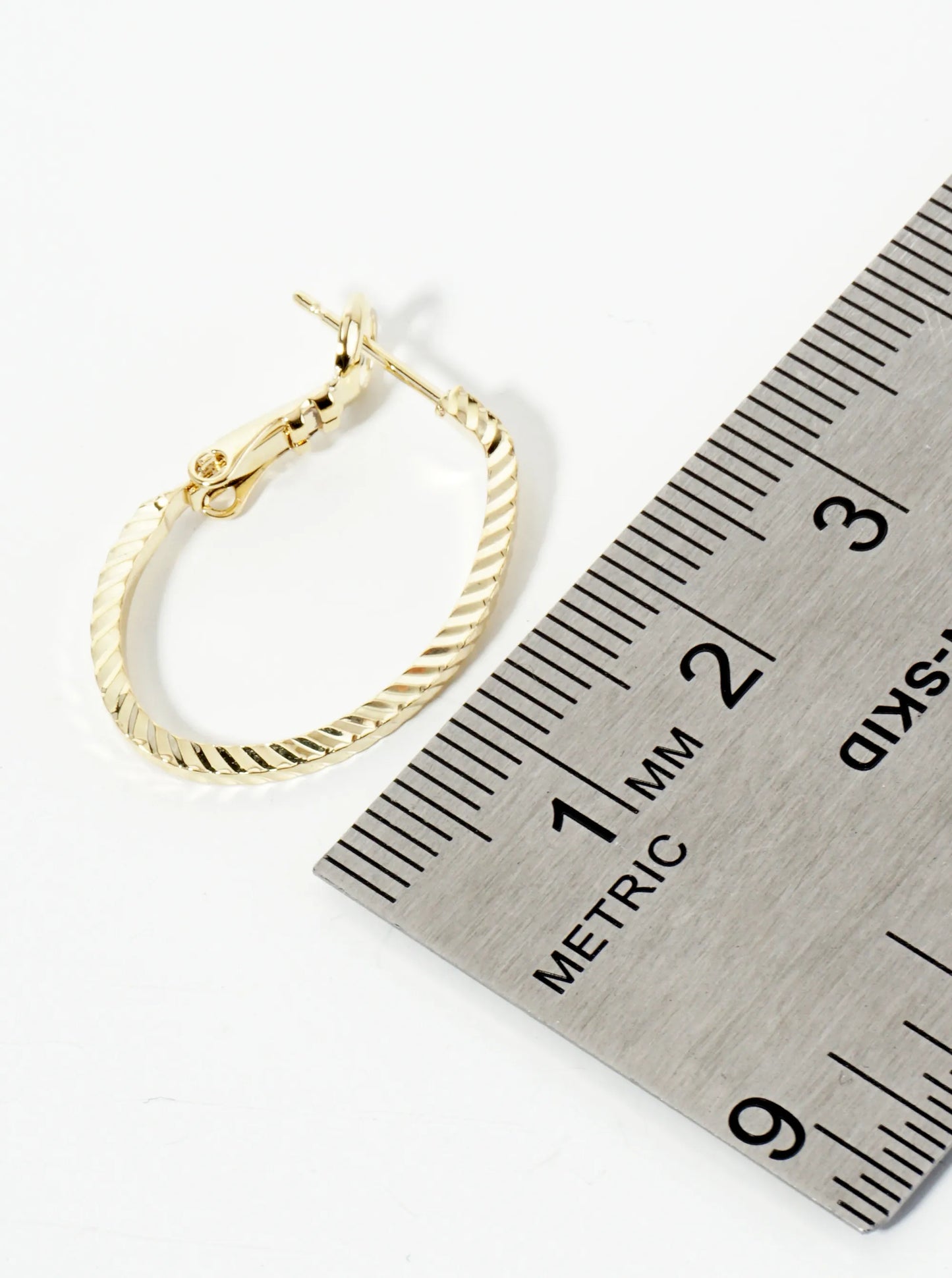 23mm 14K-Gold-Dipped Diagonal-Texture Oval Latch-Back Hoop Earrings