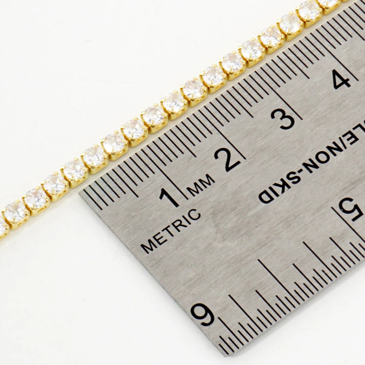 2mm Square Cubic-Zirconia 7-Inch Brass Tennis Bracelet