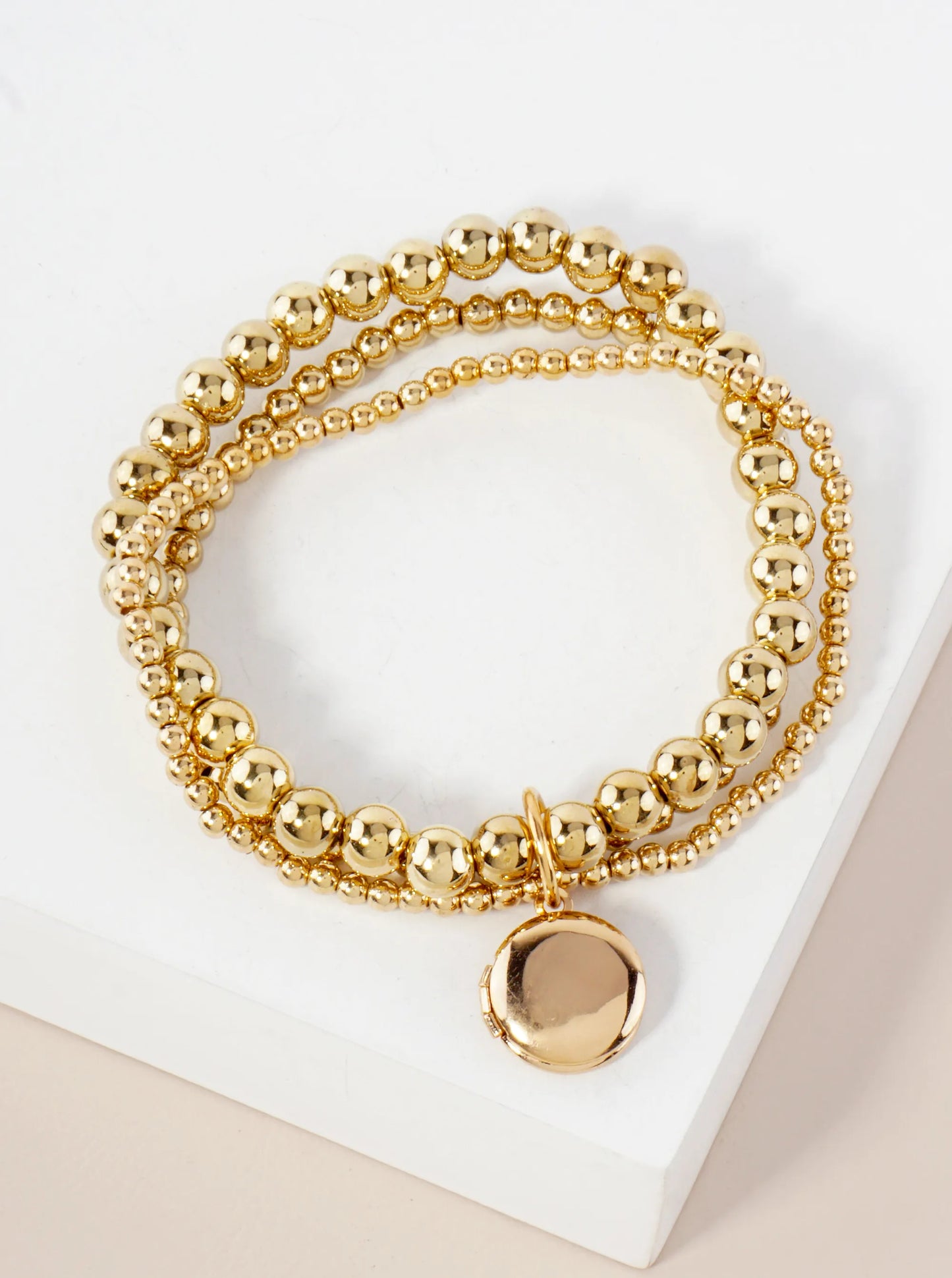 3-4-6mm Metallic-Beaded Stackable Stretch Bracelet With A Locket Charm