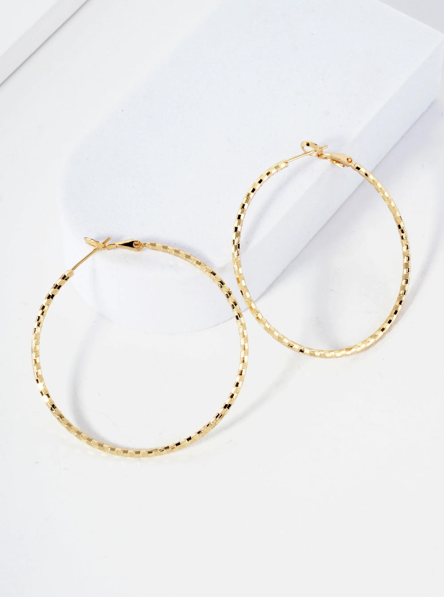 50mm Shiny Textured Brass Hoop Earrings