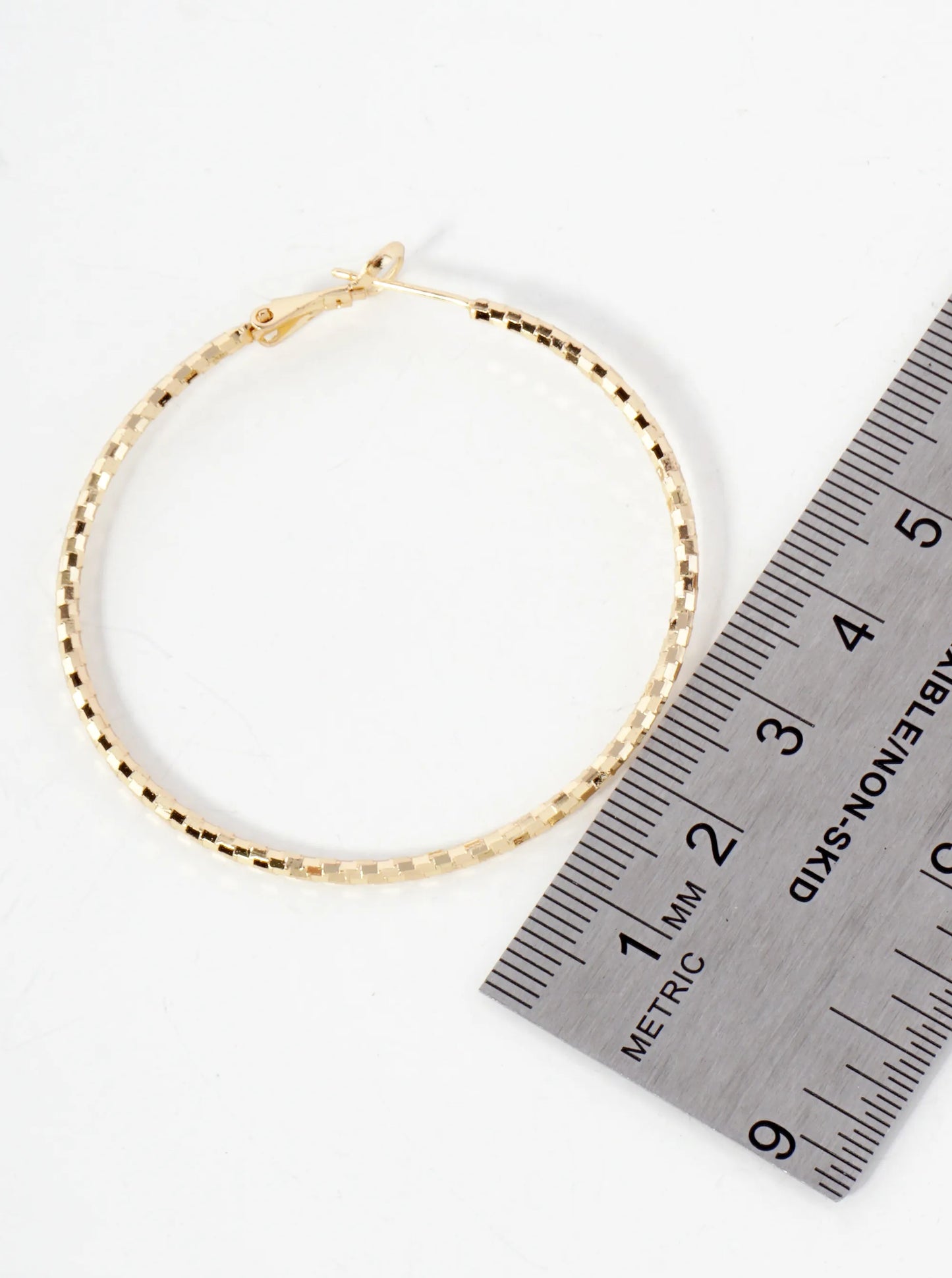 50mm Shiny Textured Brass Hoop Earrings