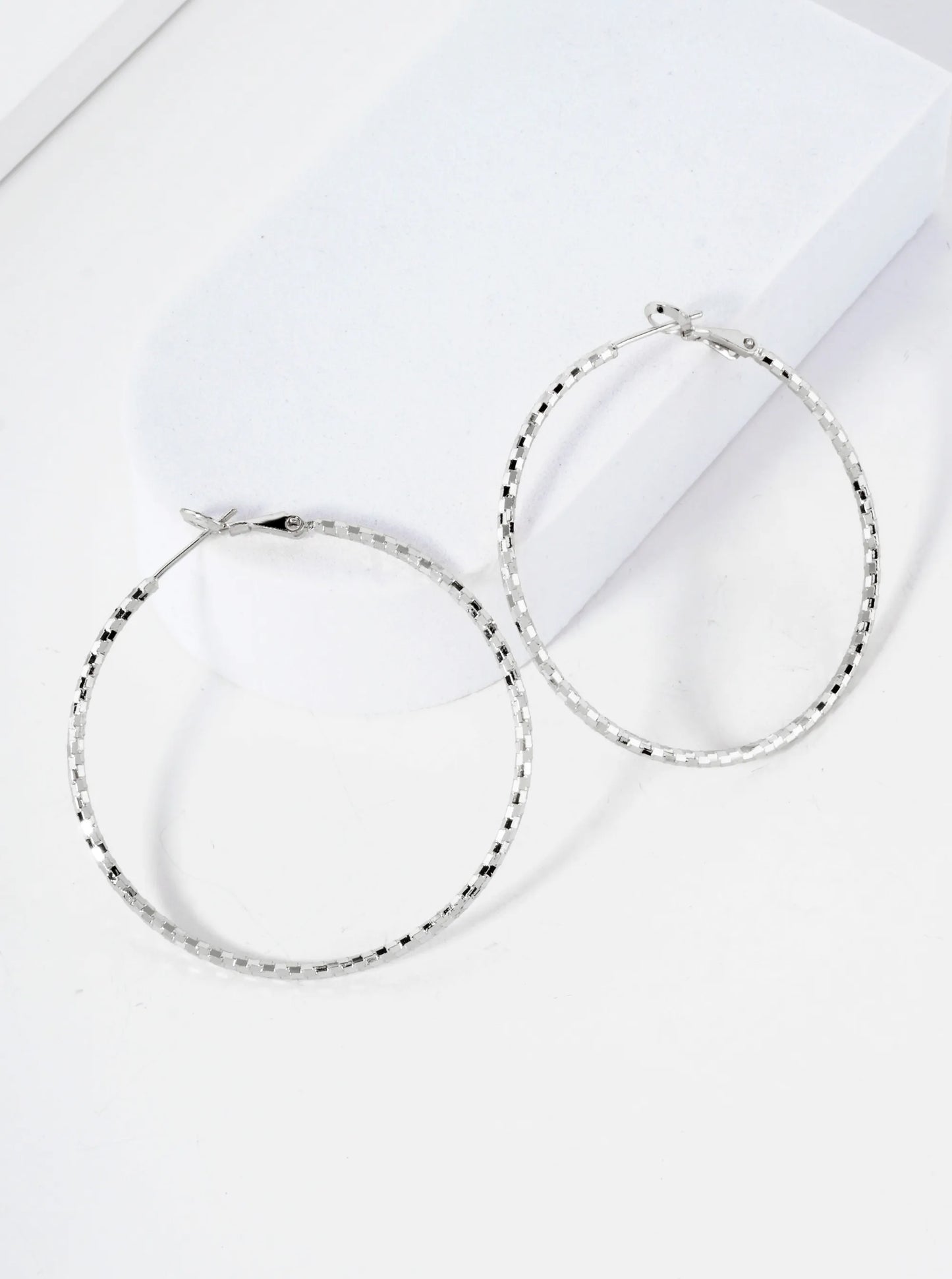 50mm Shiny Textured Brass Hoop Earrings