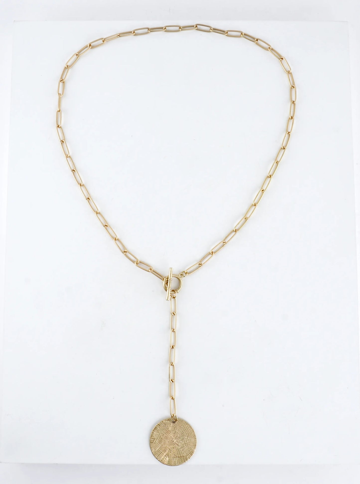 Textured Round Pendant On Lariat Toggle Necklace