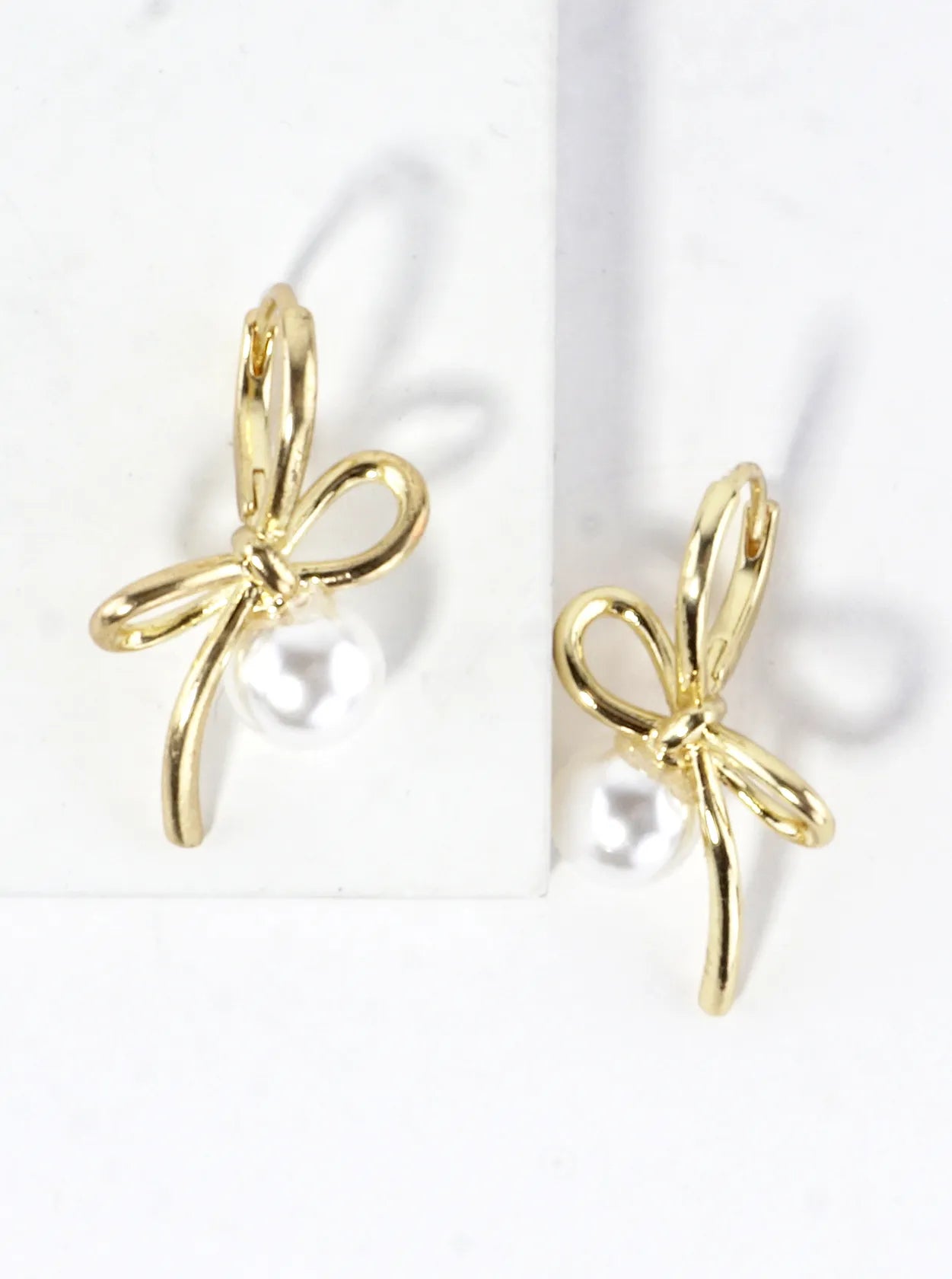 Brass Bow On Pearl Pedestal Drop Earrings