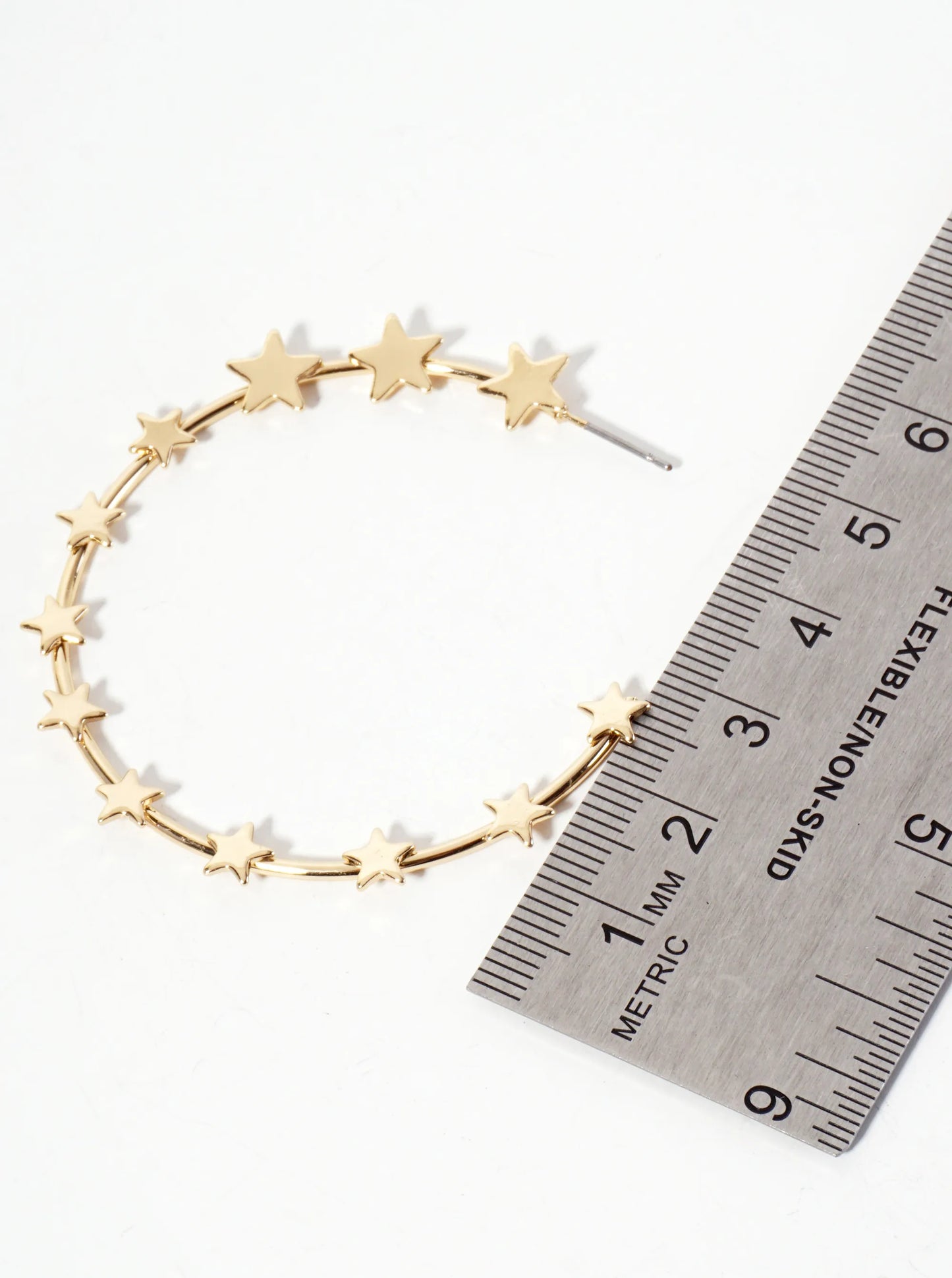 Celestial-Theme Graduated Stars Adorning The Line 45mm Open Hoop Earrings