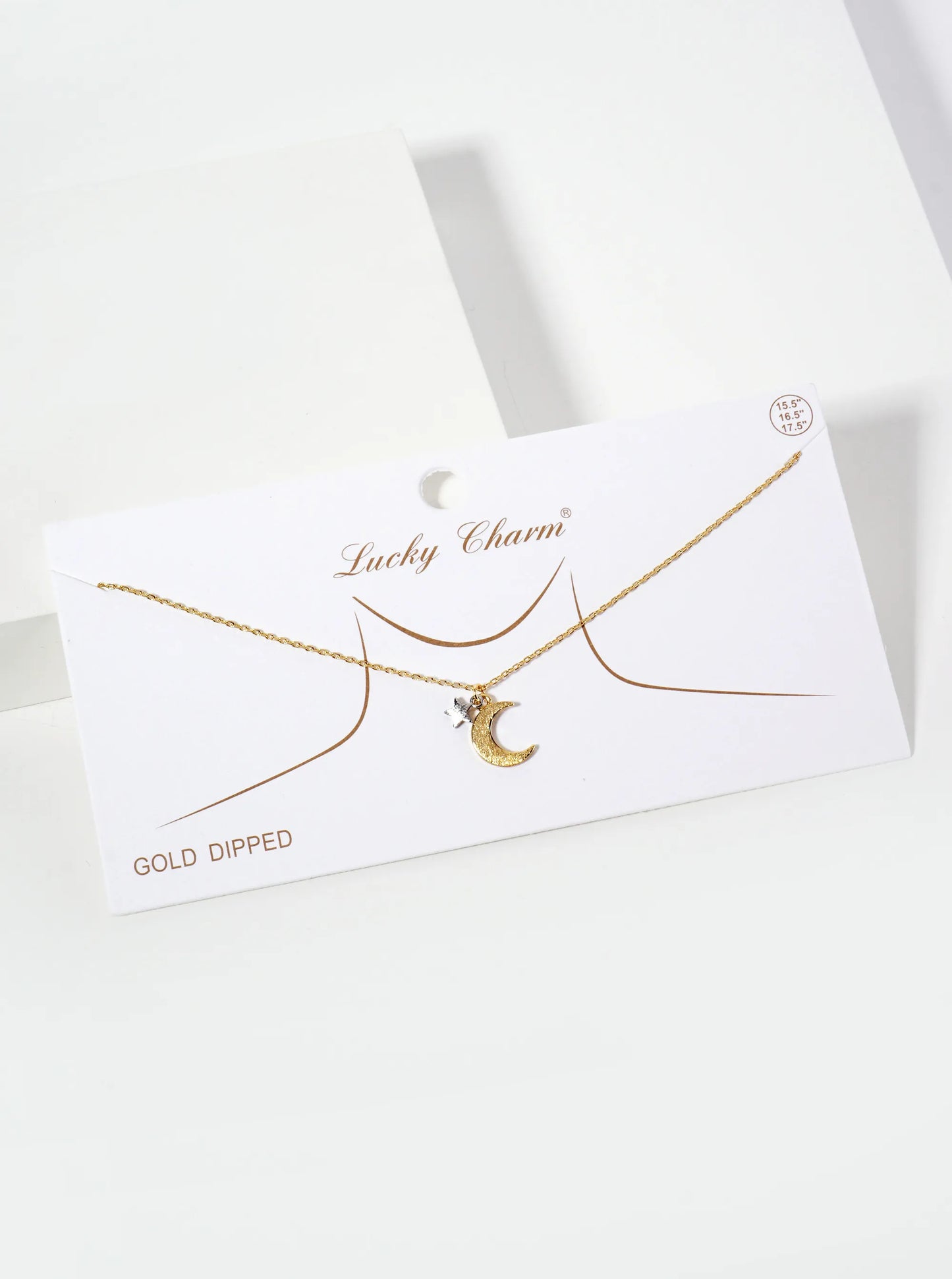 Celestial-theme 18K-Gold-Dipped Brass Brushed-Texture Dual-Tone Star-and-Moon Pendant Necklace