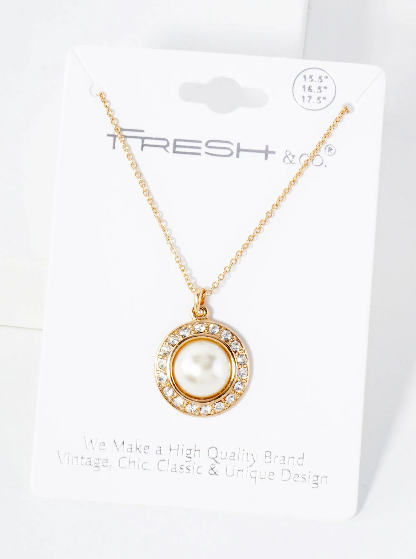 Crystal-Studded Border Highlighting A Central Pearl Pendant Necklace