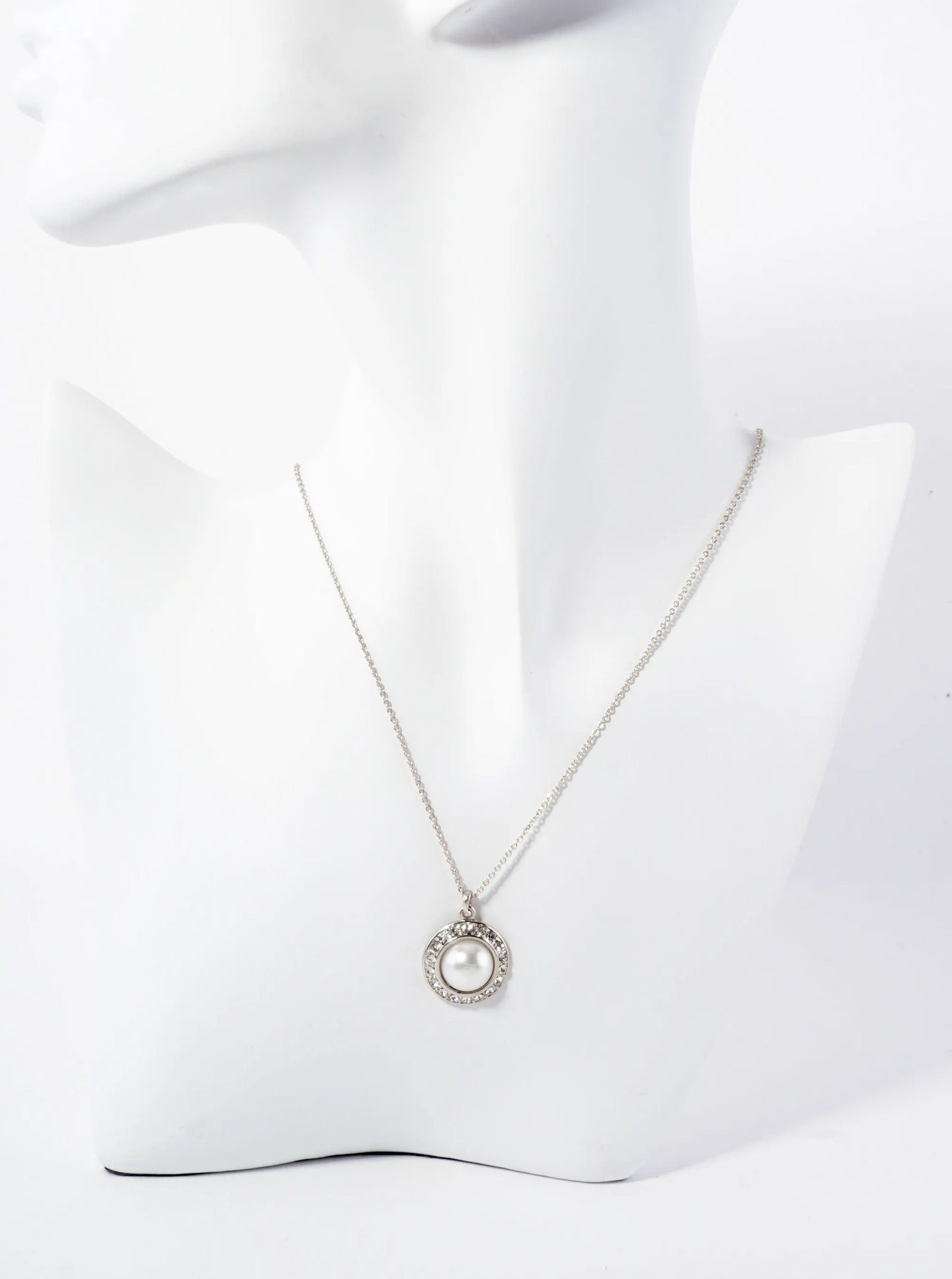Crystal-Studded Border Highlighting A Central Pearl Pendant Necklace