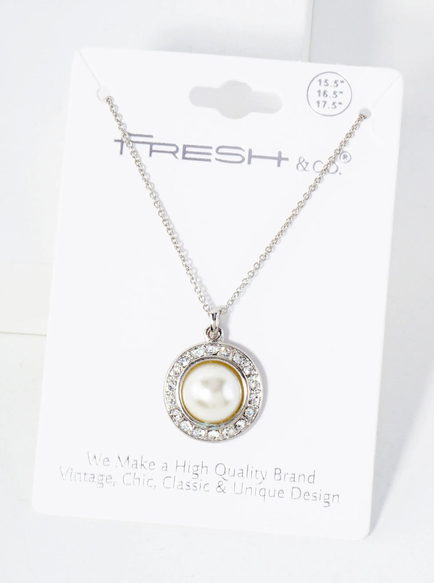 Crystal-Studded Border Highlighting A Central Pearl Pendant Necklace