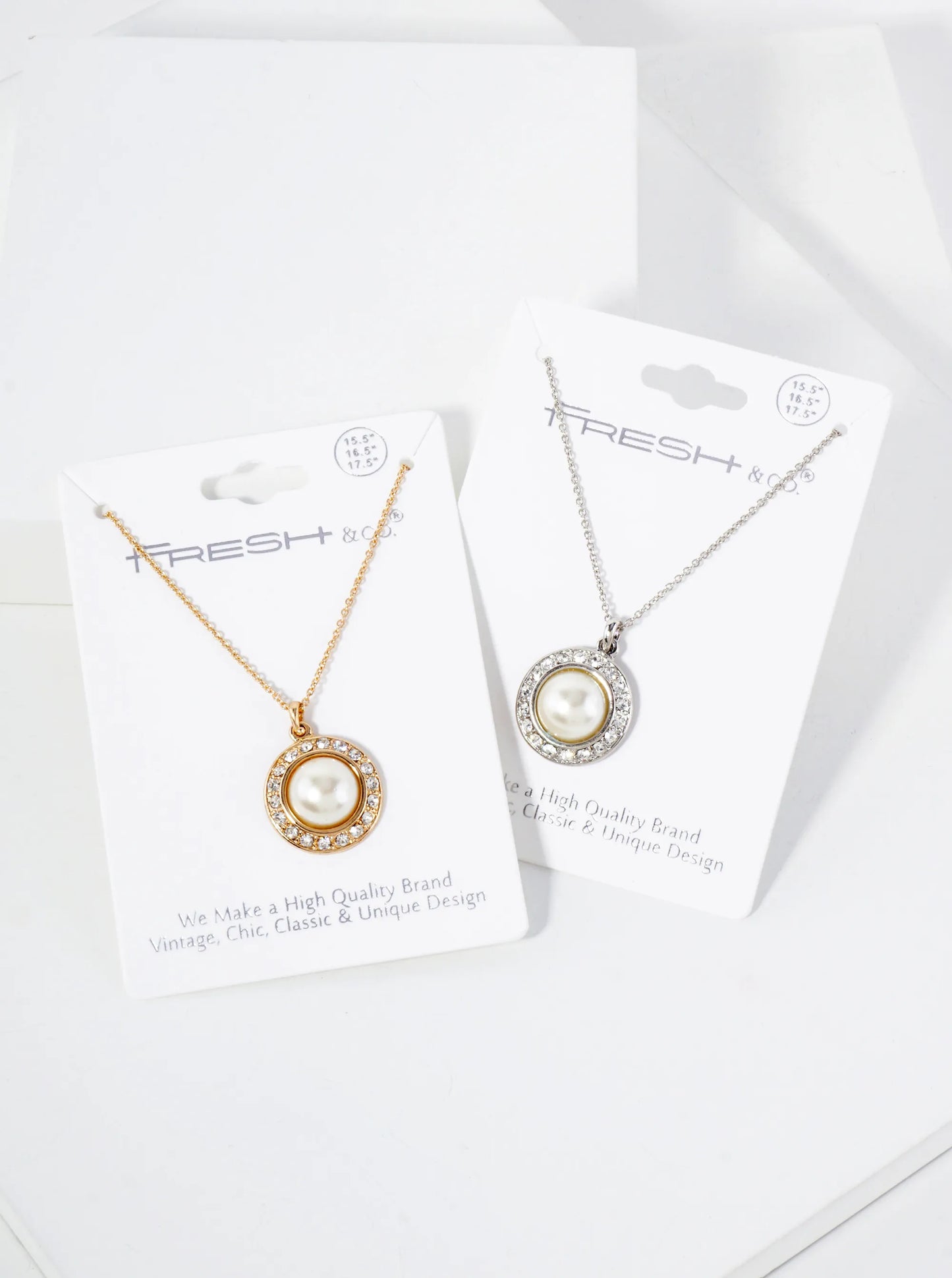 Crystal-Studded Border Highlighting A Central Pearl Pendant Necklace