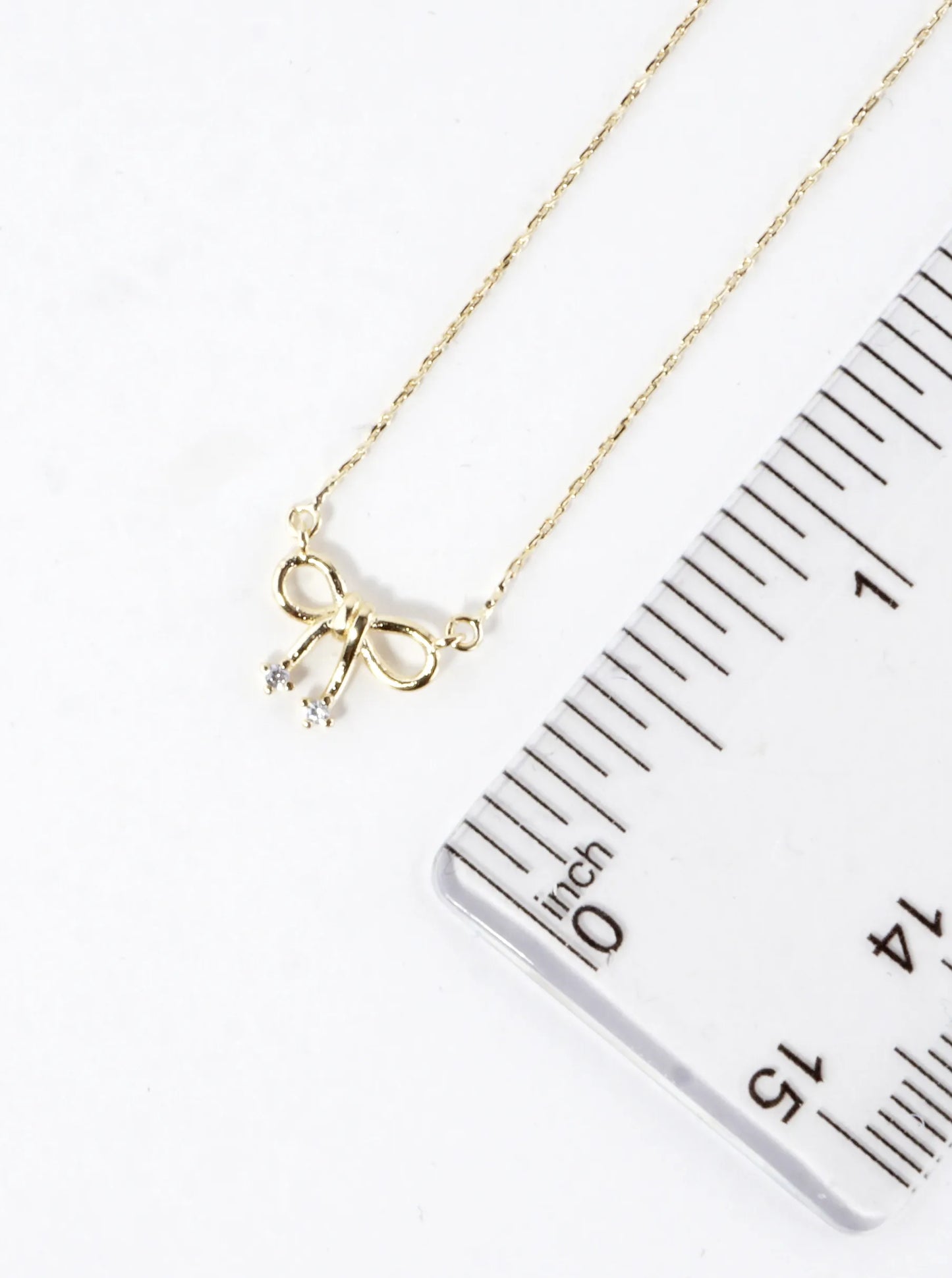 Cubic Zirconia Bow Ribbon Pendant Brass Necklace