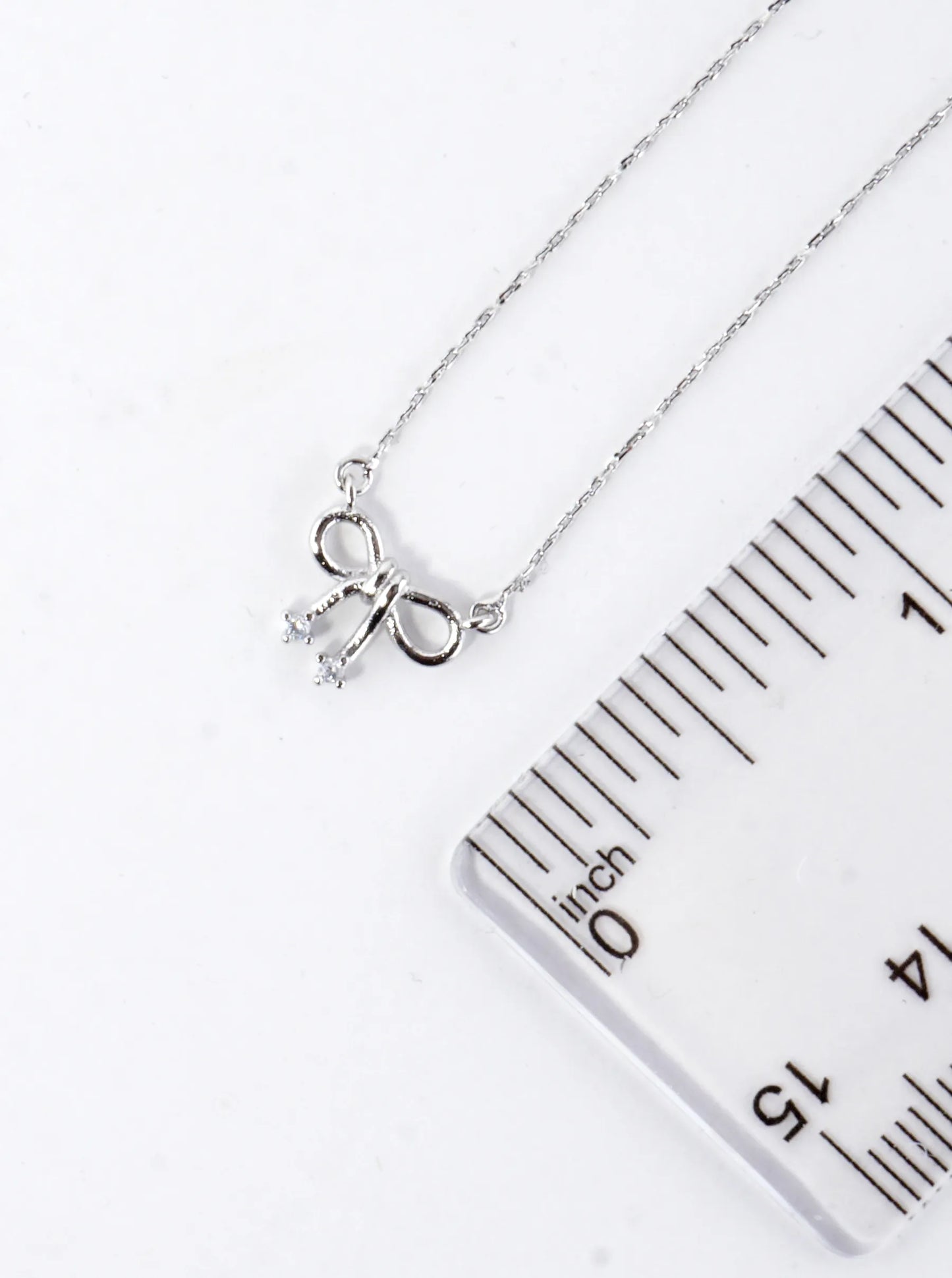 Cubic Zirconia Bow Ribbon Pendant Brass Necklace