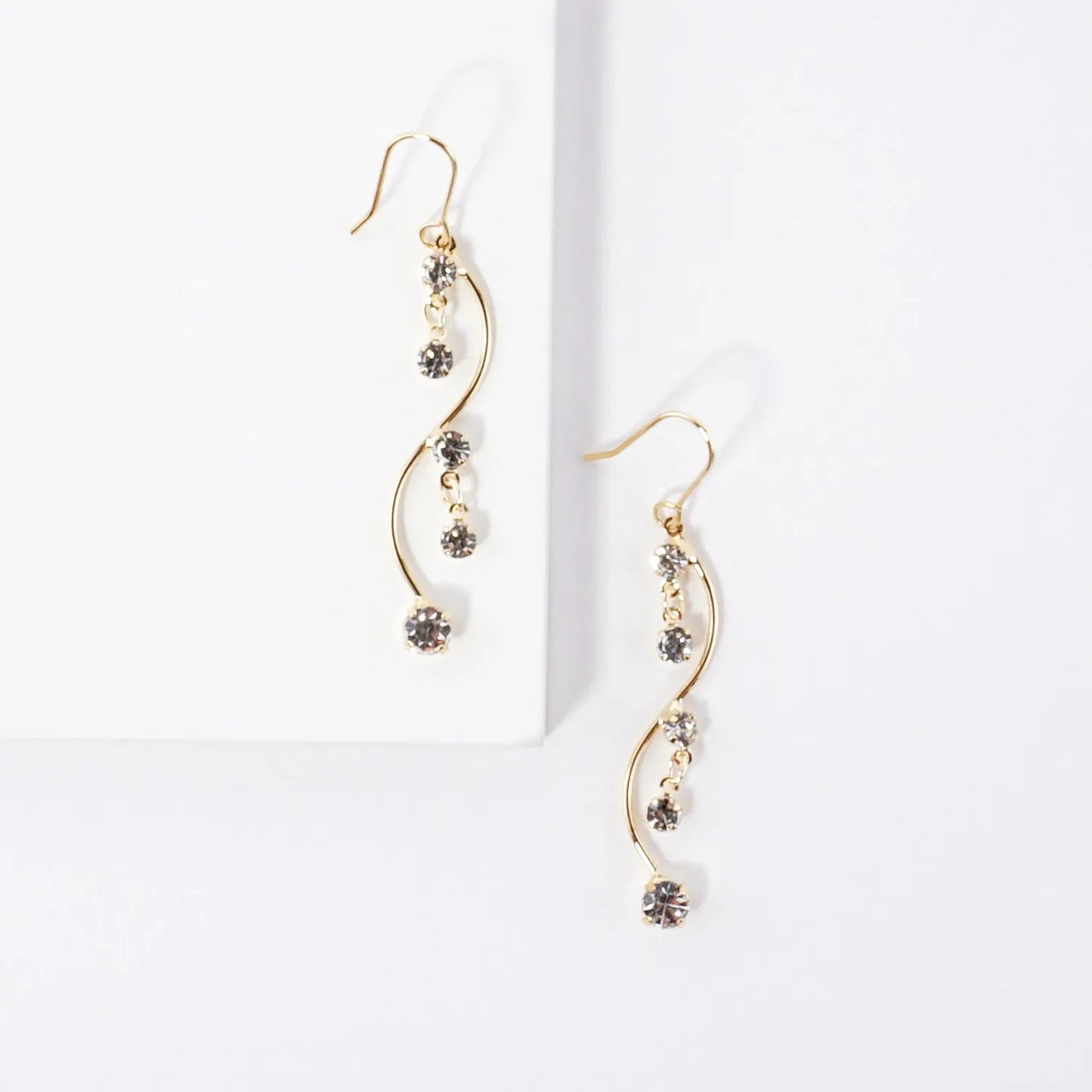 Elegant Curve Earrings With Crystal Accents