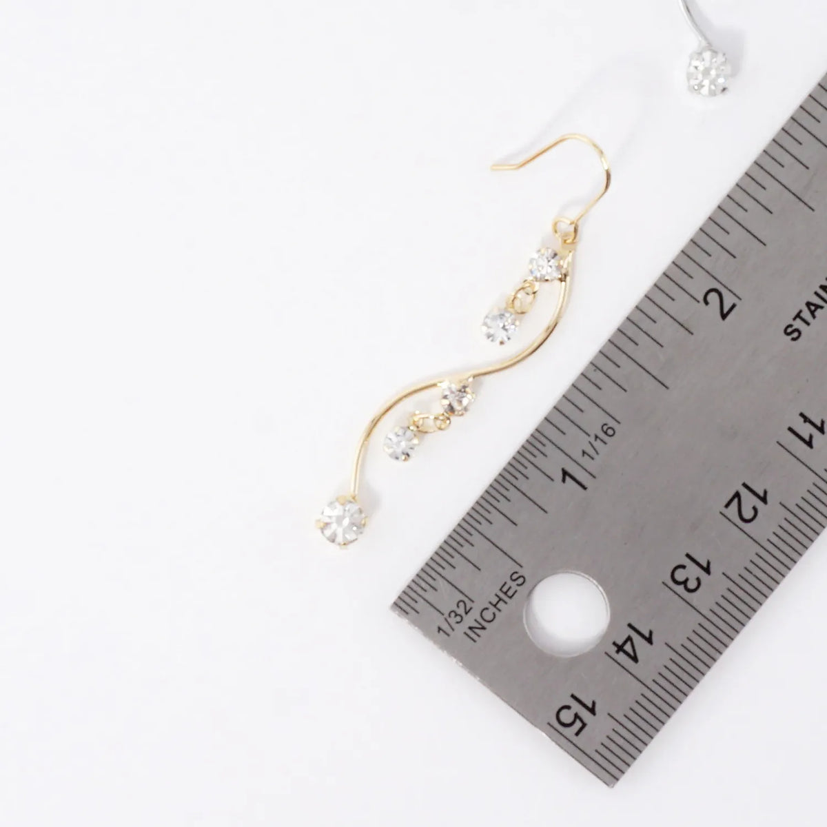 Elegant Curve Earrings With Crystal Accents