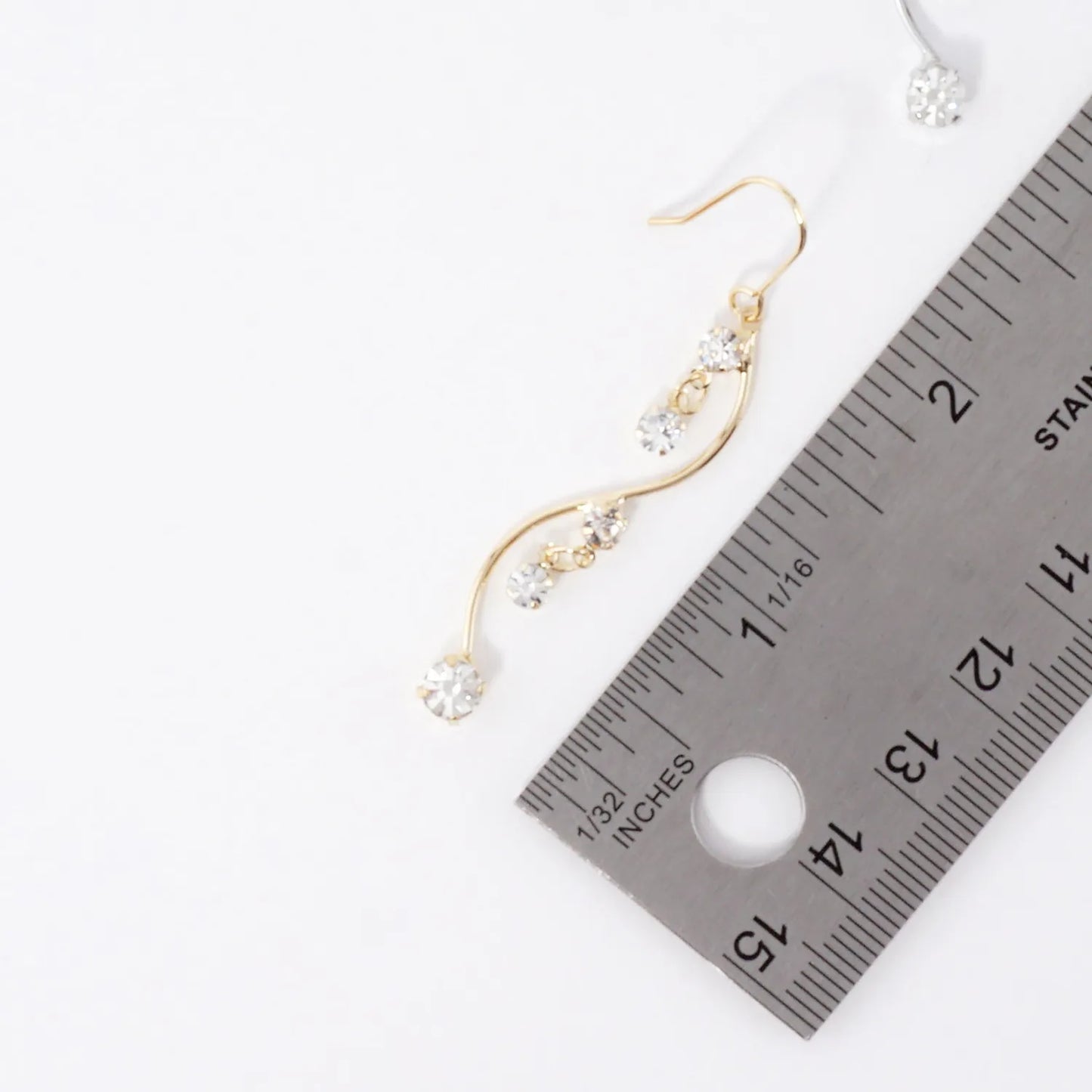 Elegant Curve Earrings With Crystal Accents