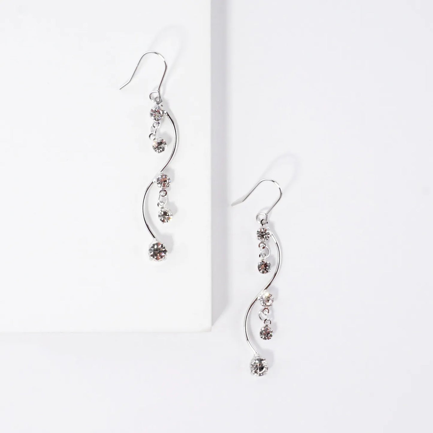 Elegant Curve Earrings With Crystal Accents