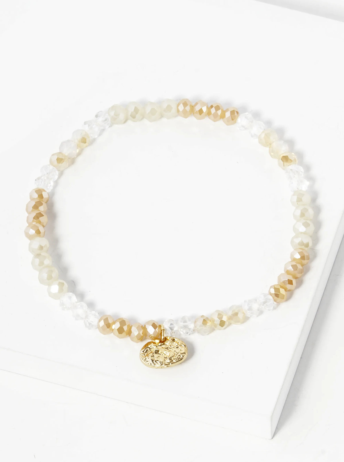 Faceted Glass Beaded Ombre Stretch Bracelet With Oval Metal Charm